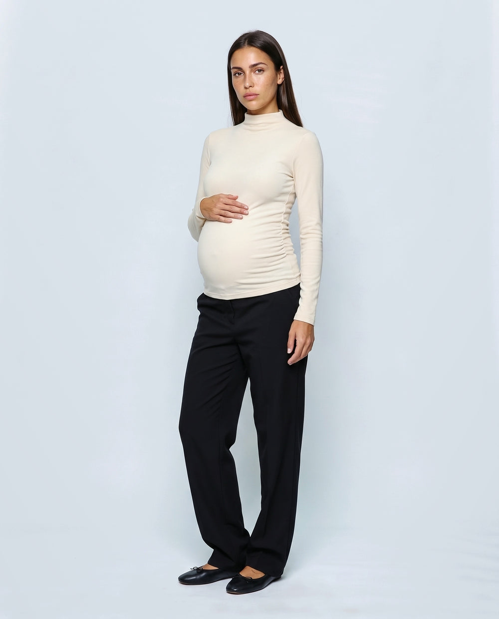 The Maternity Mock-Neck Top in Cream, front view