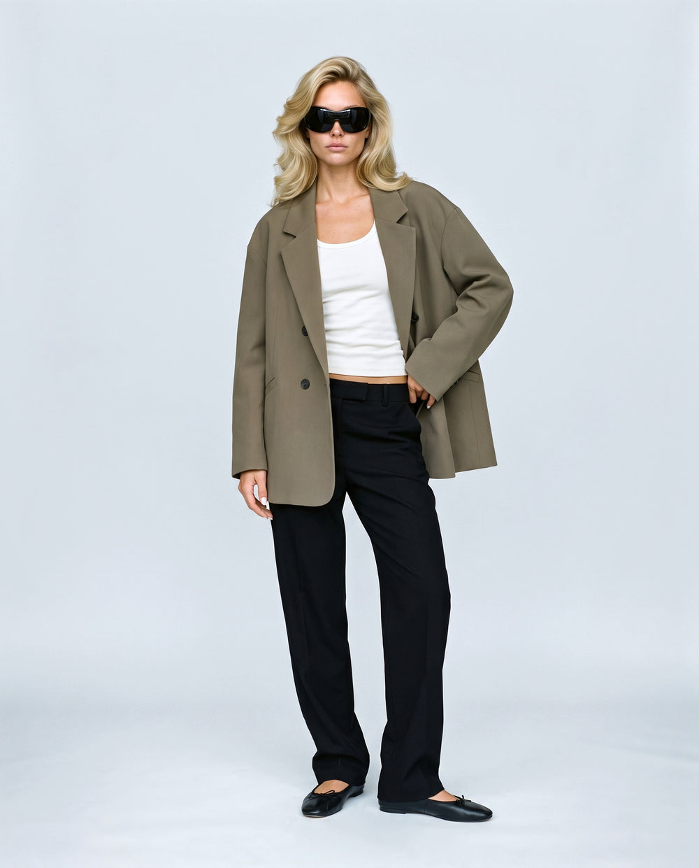 The Relaxed Double-Breasted Blazer in Khaki olive, front view on a non-pregnant model