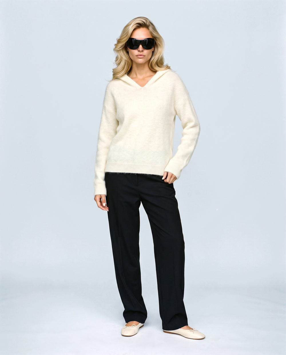 The Soft-Touch Knit Hoodie in Cream, front view on a non-pregnant model
