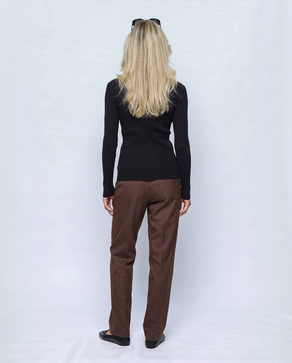 Alma Cross-Front Top in Black, back view on a non-pregnant model