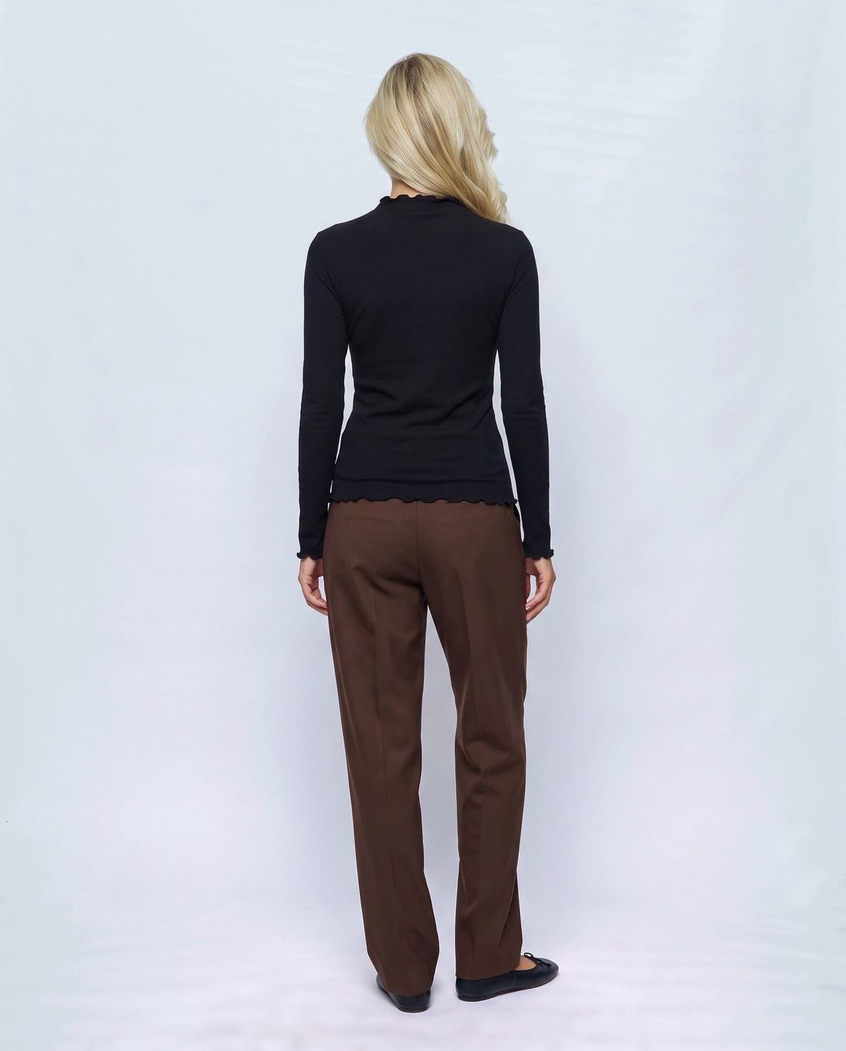Anais Lettuce-Edge Top in Black, back view on a non-pregnant model