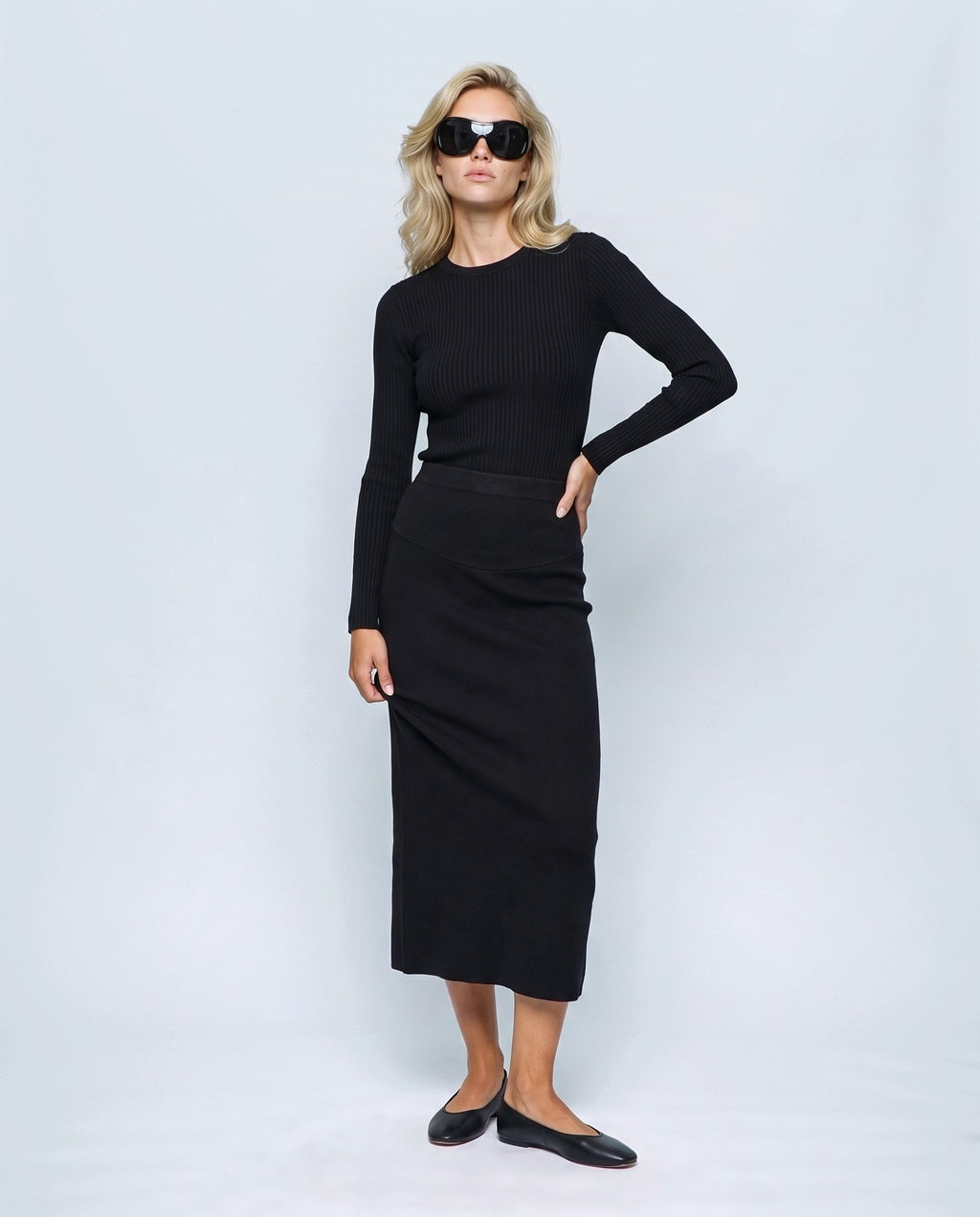 Lena Over-Belly Pencil Skirt in Black, front view on a non-pregnant model