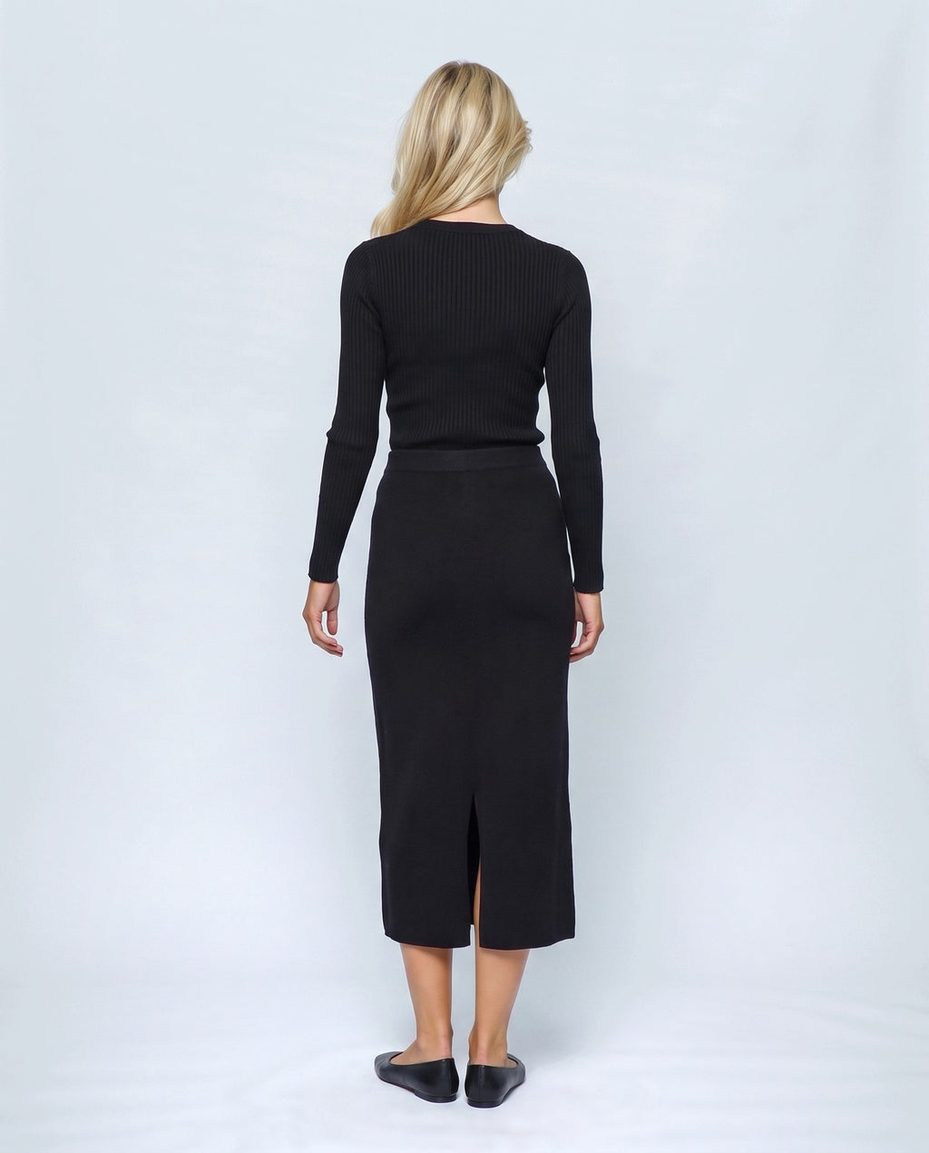 Lena Over-Belly Pencil Skirt in Black, back view on a non-pregnant model