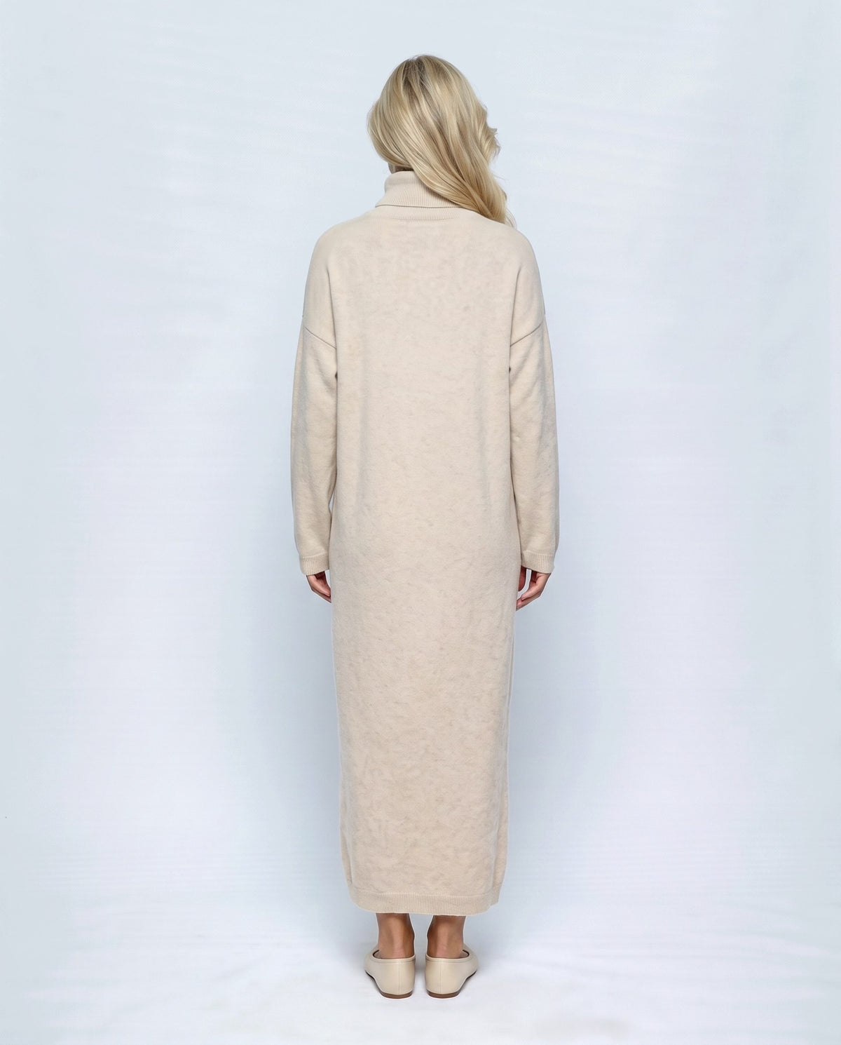 Lou Roll-Neck Maxi Dress in Apricot, back view on a non-pregnant model