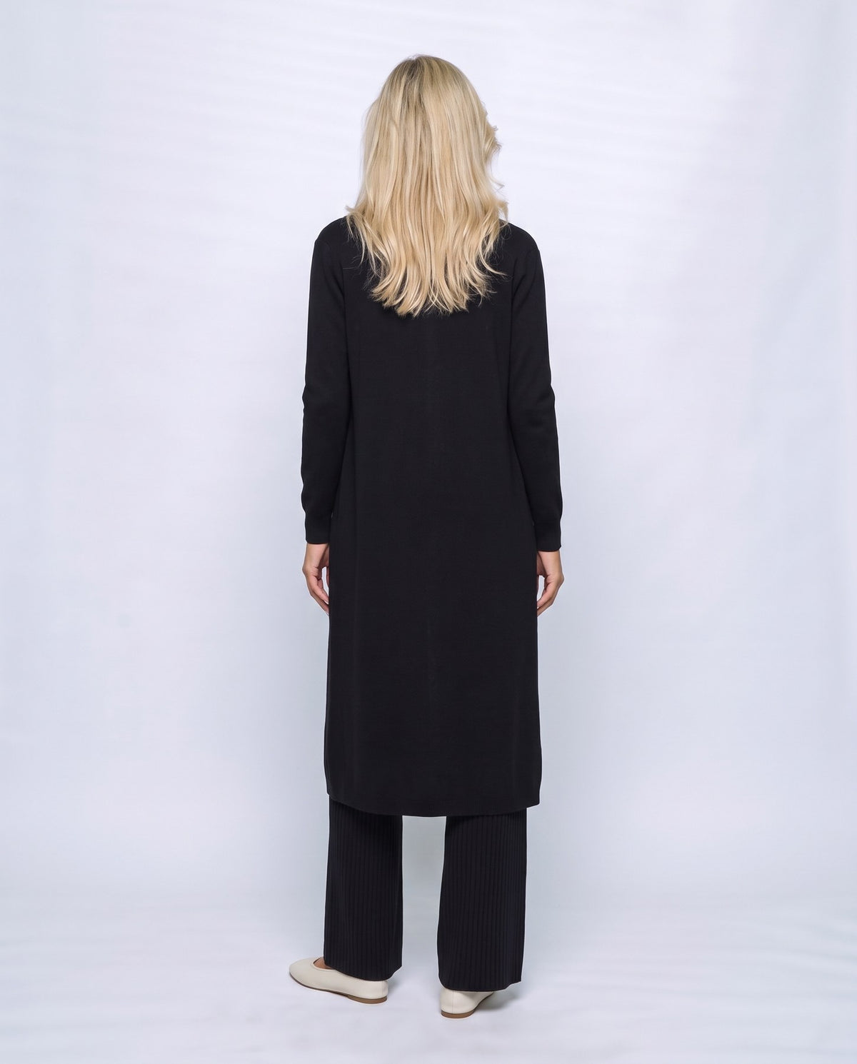 Manon Three-Piece Set in Black, back view on a non-pregnant model