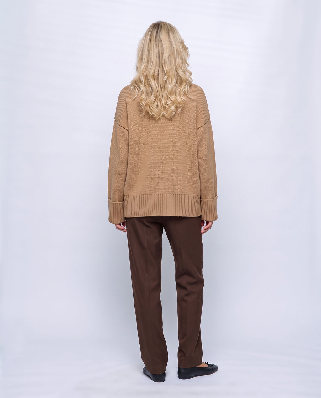 Louise Relaxed Roll-Neck Sweater in Camel, back view on a non-pregnant model