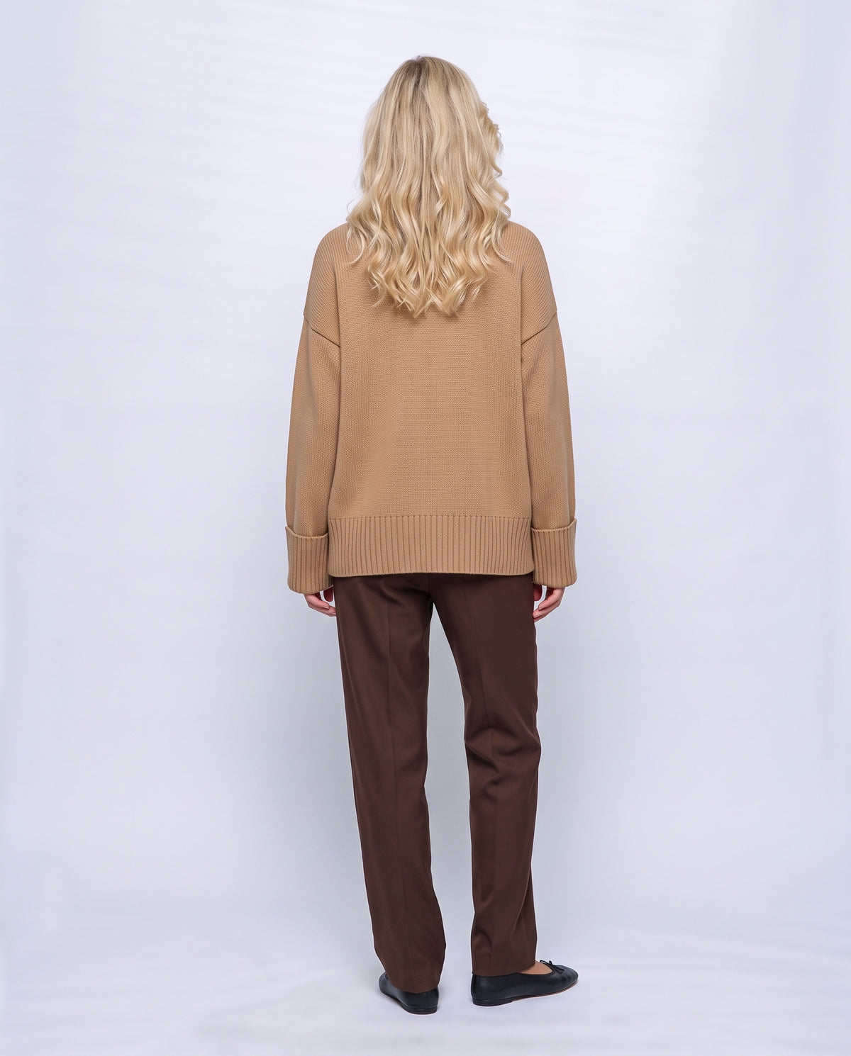 Louise Relaxed Roll-Neck Sweater in Camel, back view on a non-pregnant model