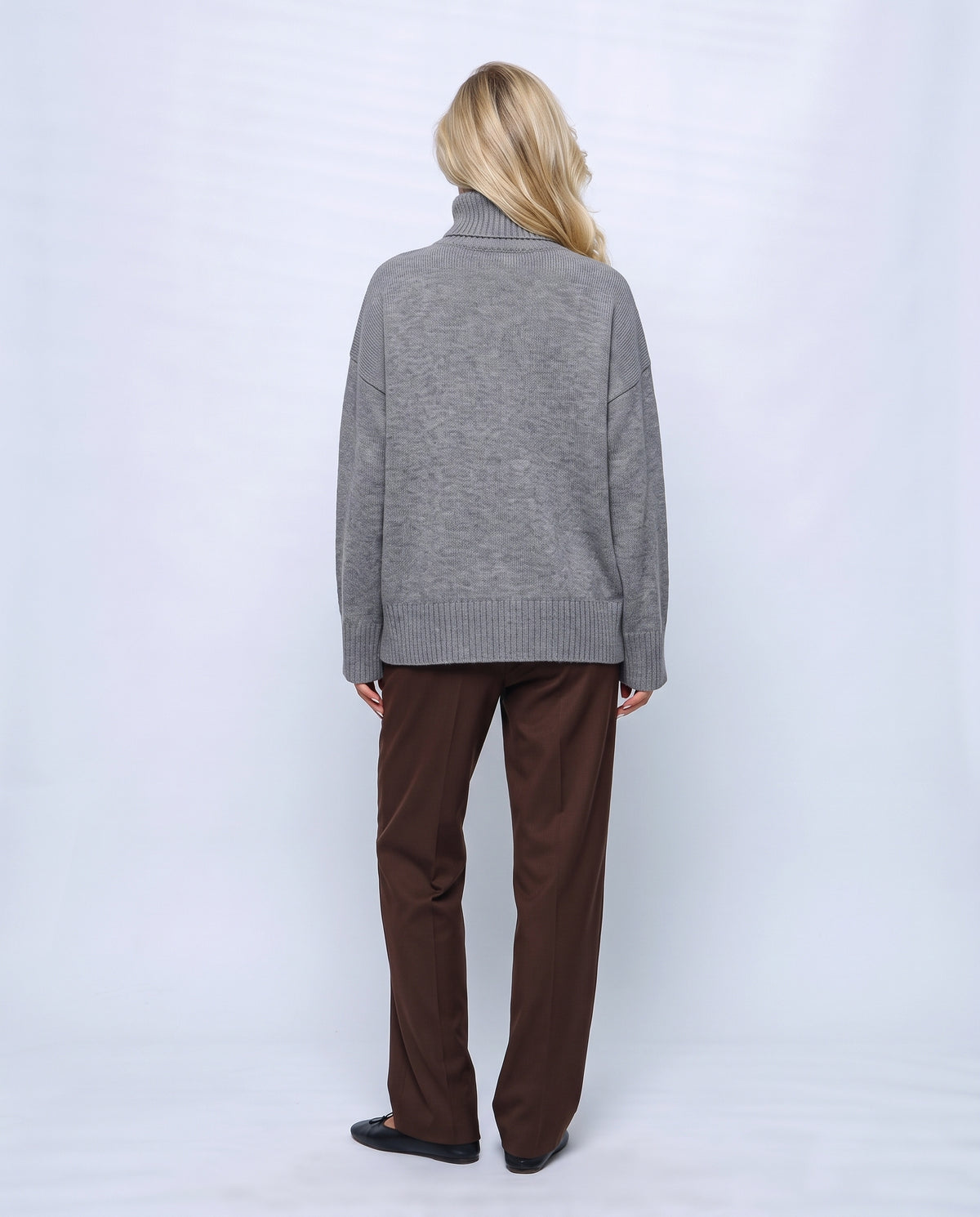 Louise Relaxed Roll-Neck Sweater in Grey, back view on a non-pregnant model