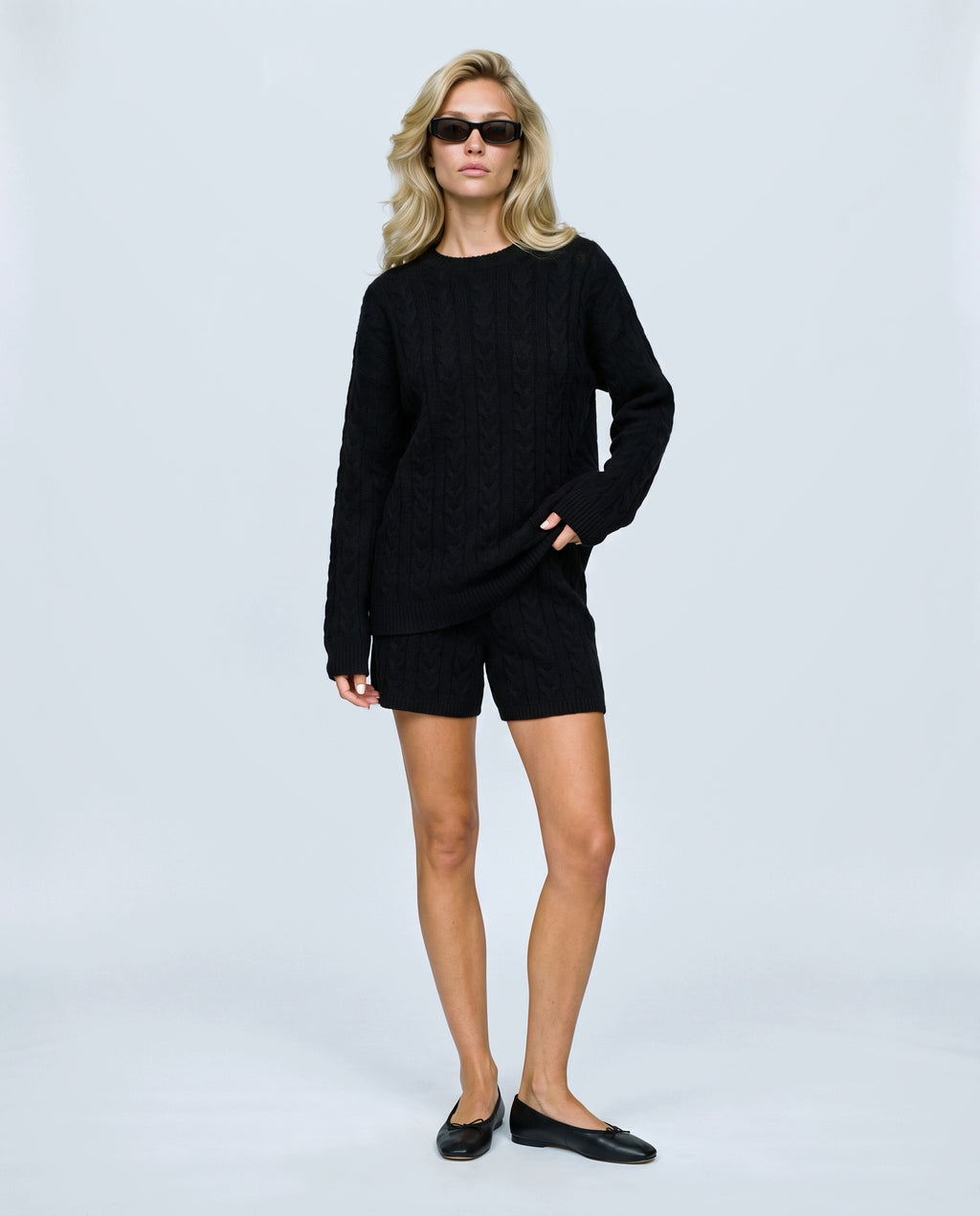 The Cable Knit Shorts Set in Black, front view on a non-pregnant model