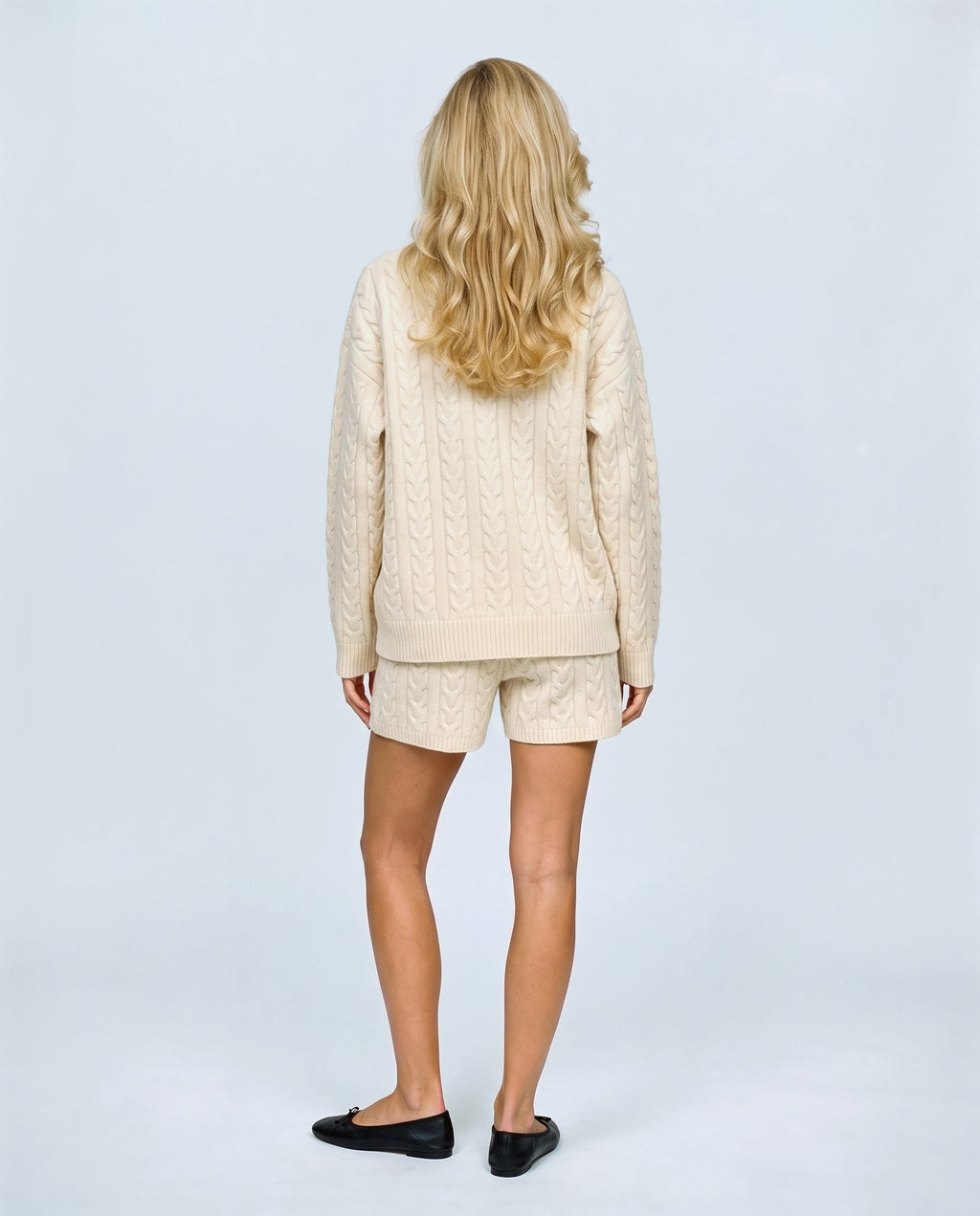 The Cable Knit Shorts Set in Cream, back view on a non-pregnant model