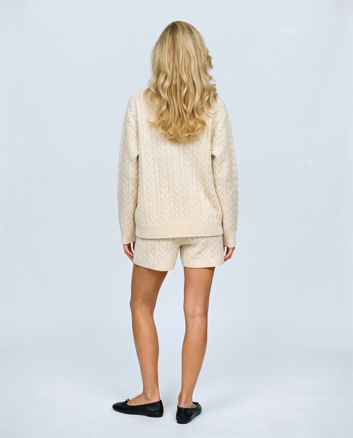 The Cable Knit Shorts Set in Cream, back view on a non-pregnant model