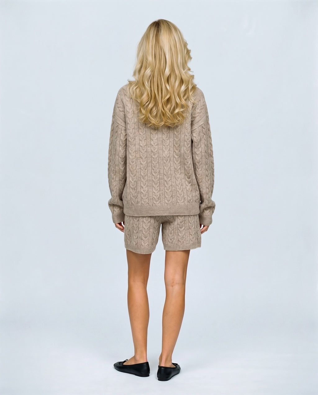 The Cable Knit Shorts Set in Oatmeal, back view on a non-pregnant model