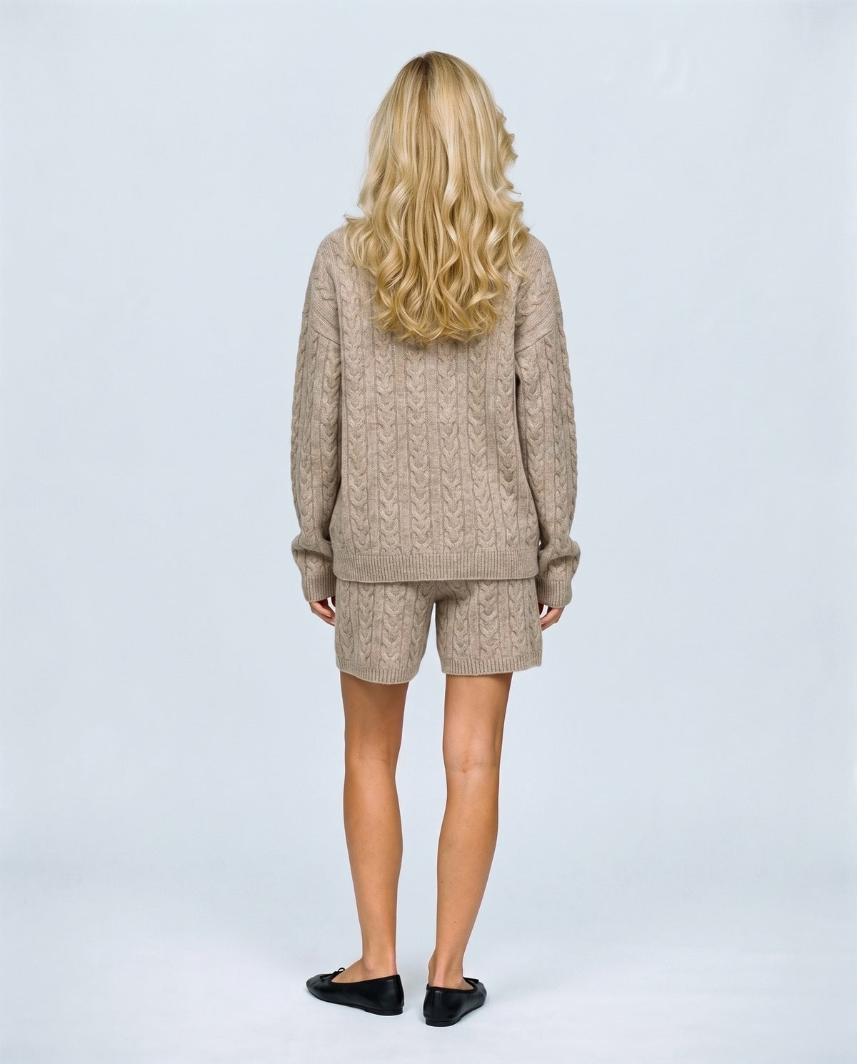 The Cable Knit Shorts Set in Oatmeal, back view on a non-pregnant model