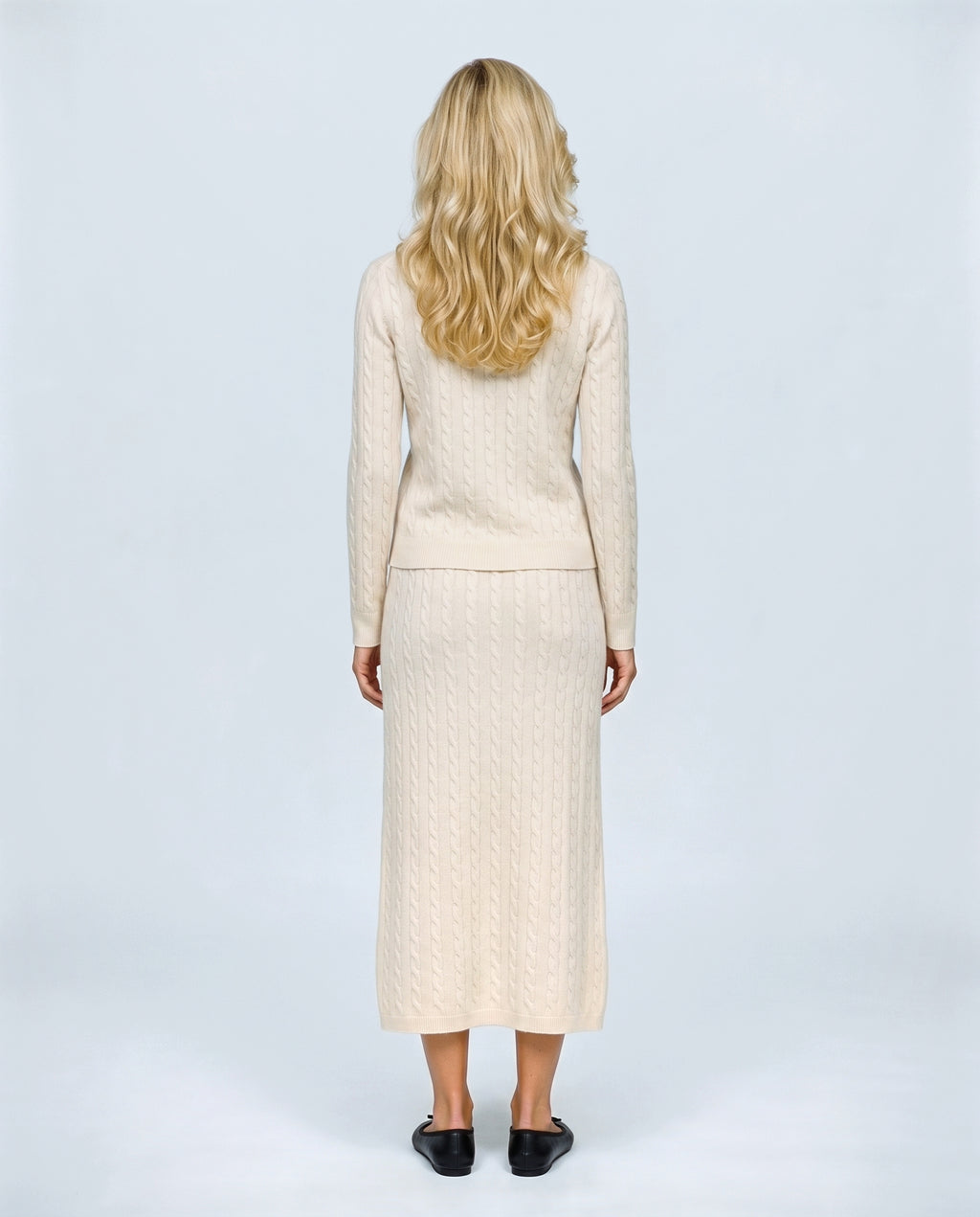 The Textured Knit Top & Skirt Set in Cream, back view on a non-pregnant model