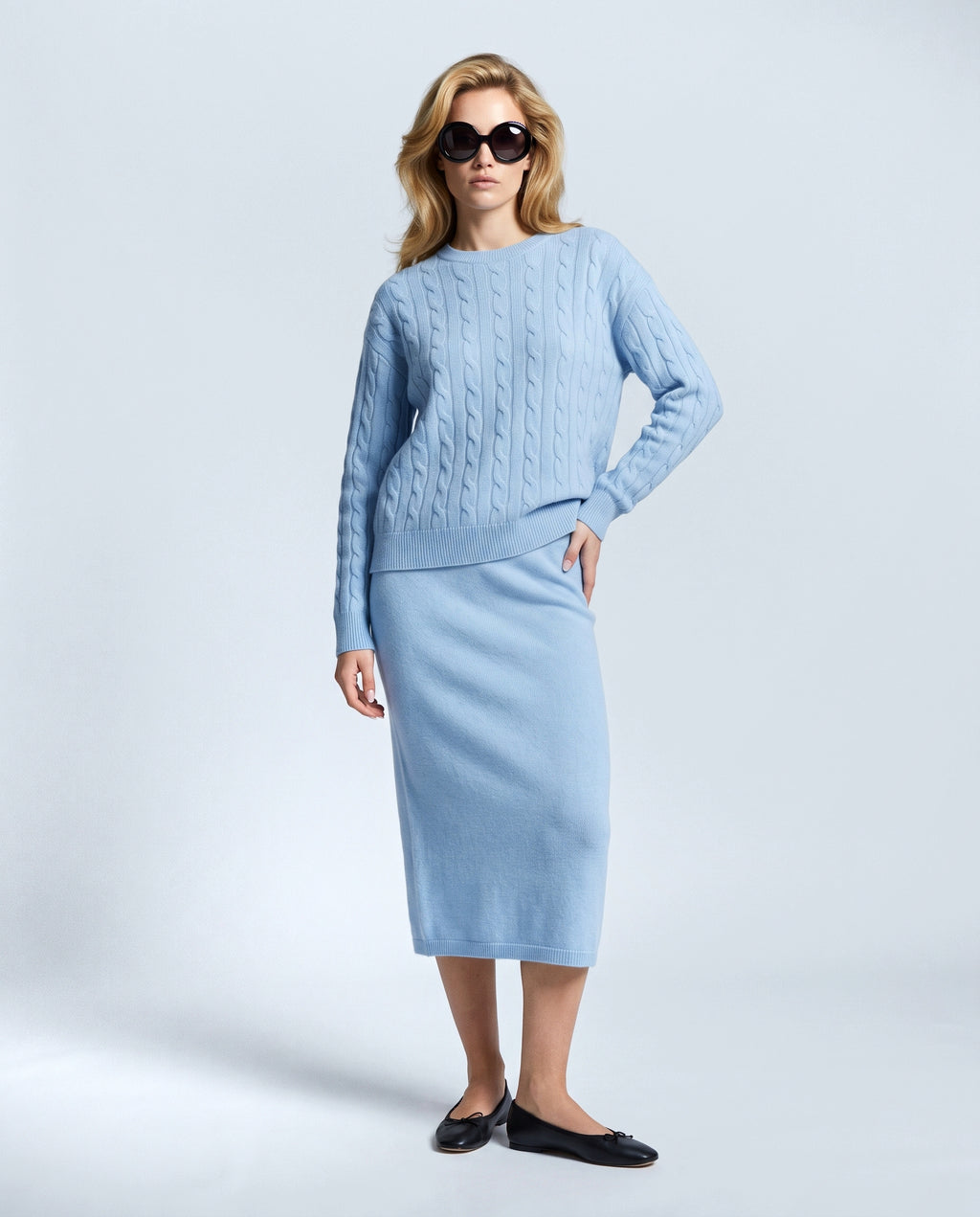 The Textured Knit Top & Skirt Set in Powder blue, front view on a non-pregnant model