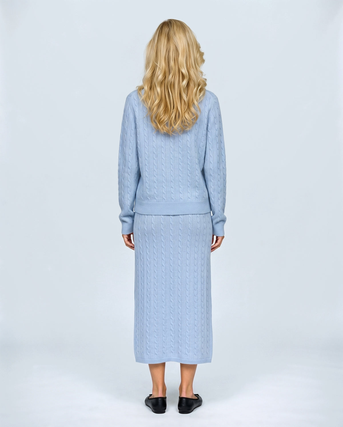 The Textured Knit Top & Skirt Set in Powder blue, back view on a non-pregnant model
