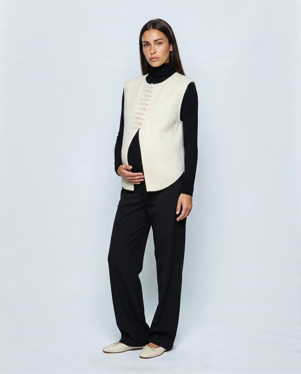 The Knot-Button Knit Vest in Black, front view