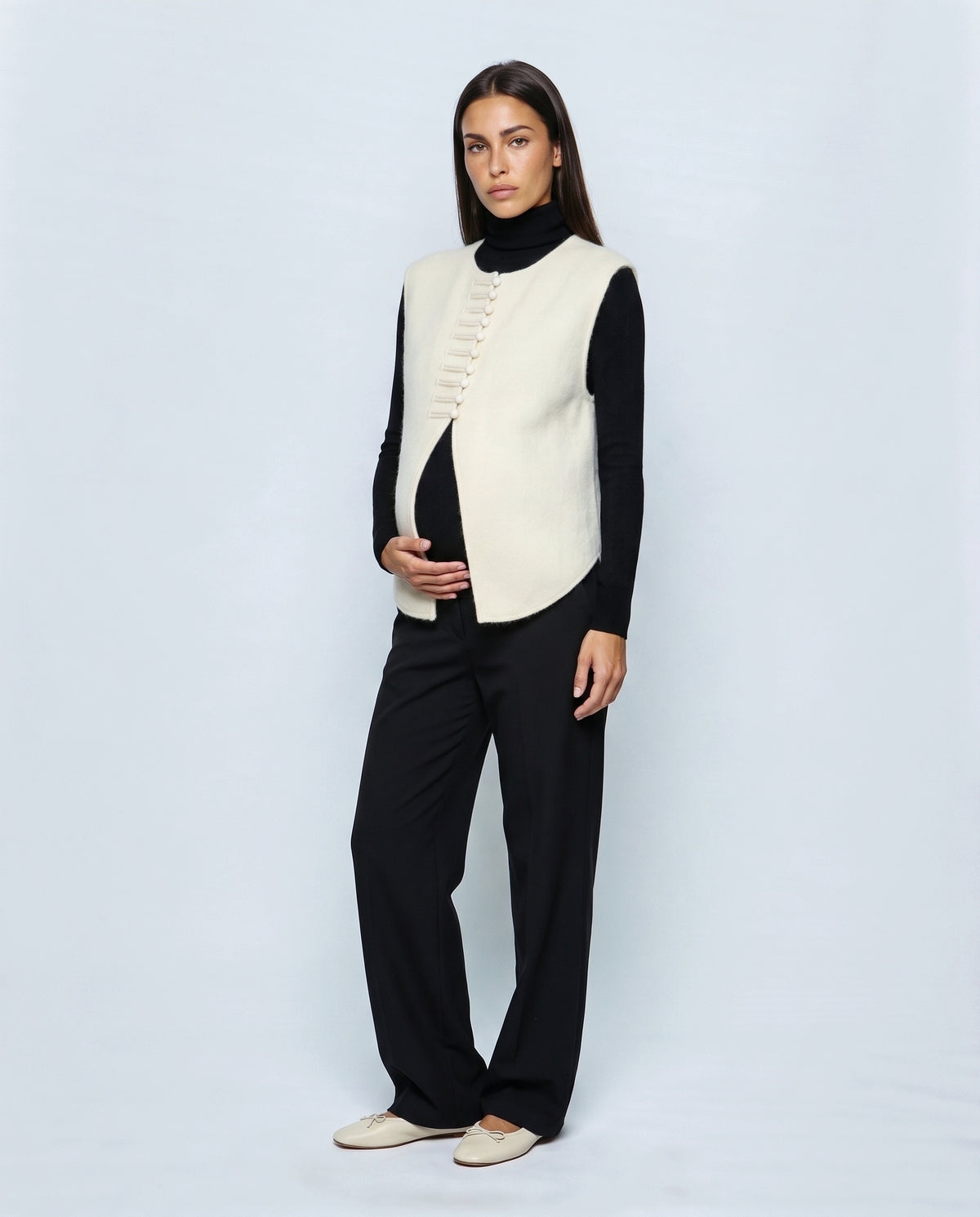 The Knot-Button Knit Vest in Black, front view