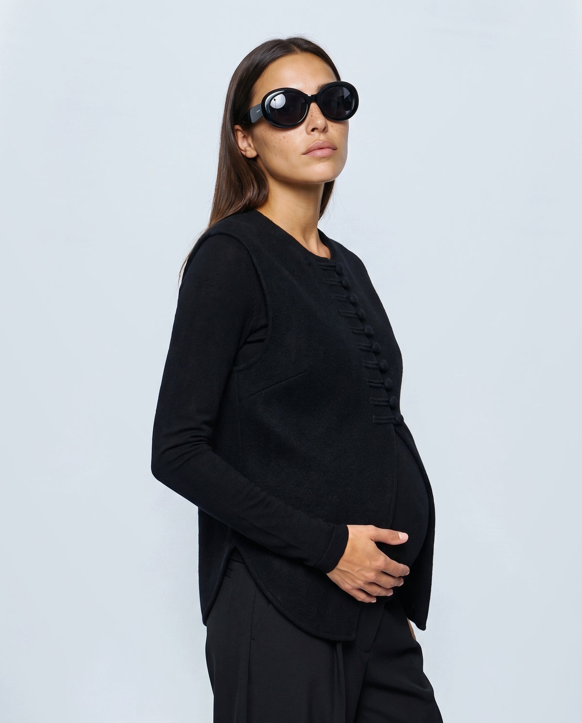 The Knot-Button Knit Vest in Black, side view