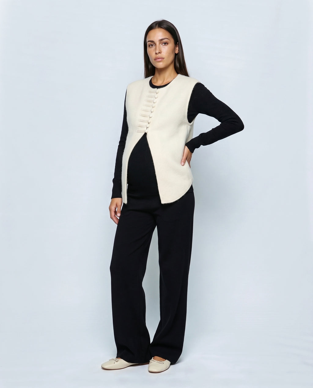 The Knot-Button Knit Vest in Cream, front view