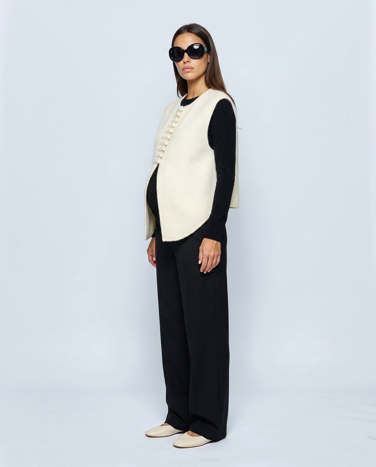 The Knot-Button Knit Vest in Cream, side view