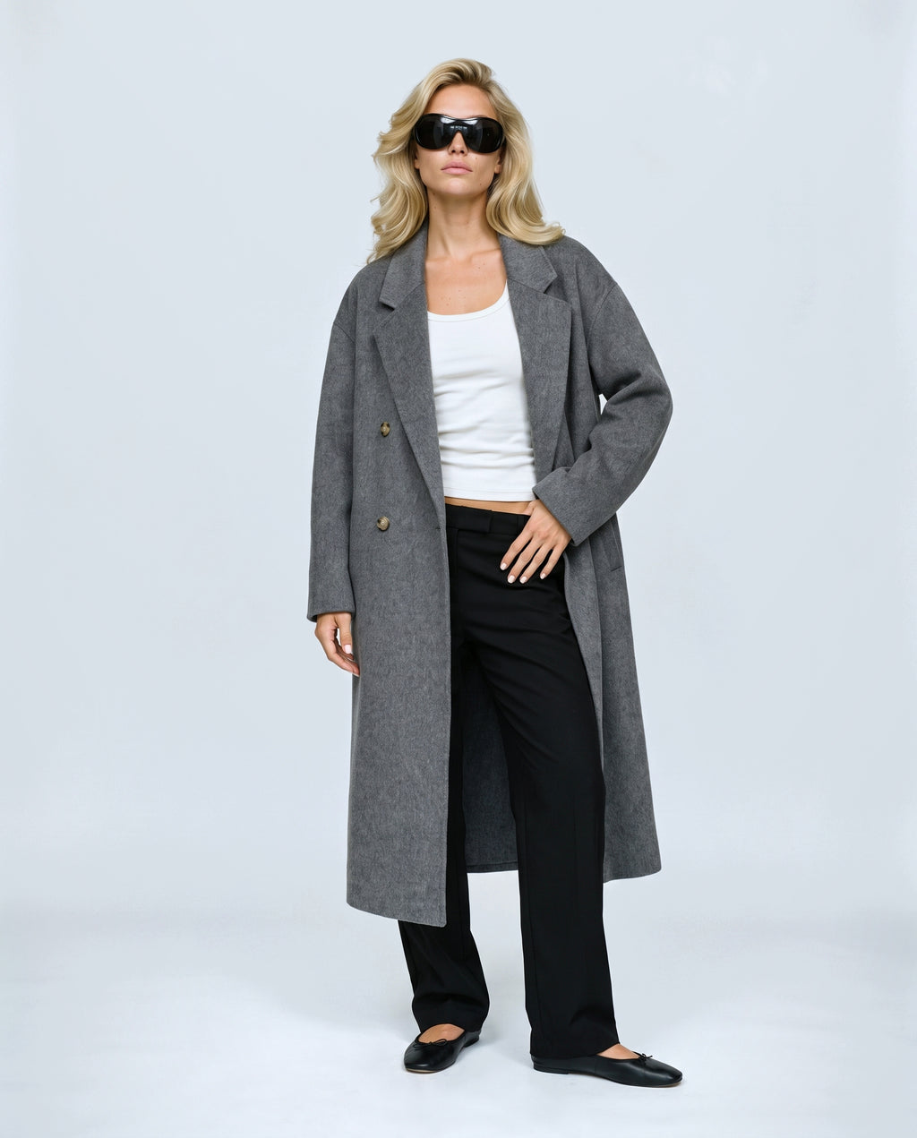 The Cocoon Overcoat in Grey, front view on a non-pregnant model
