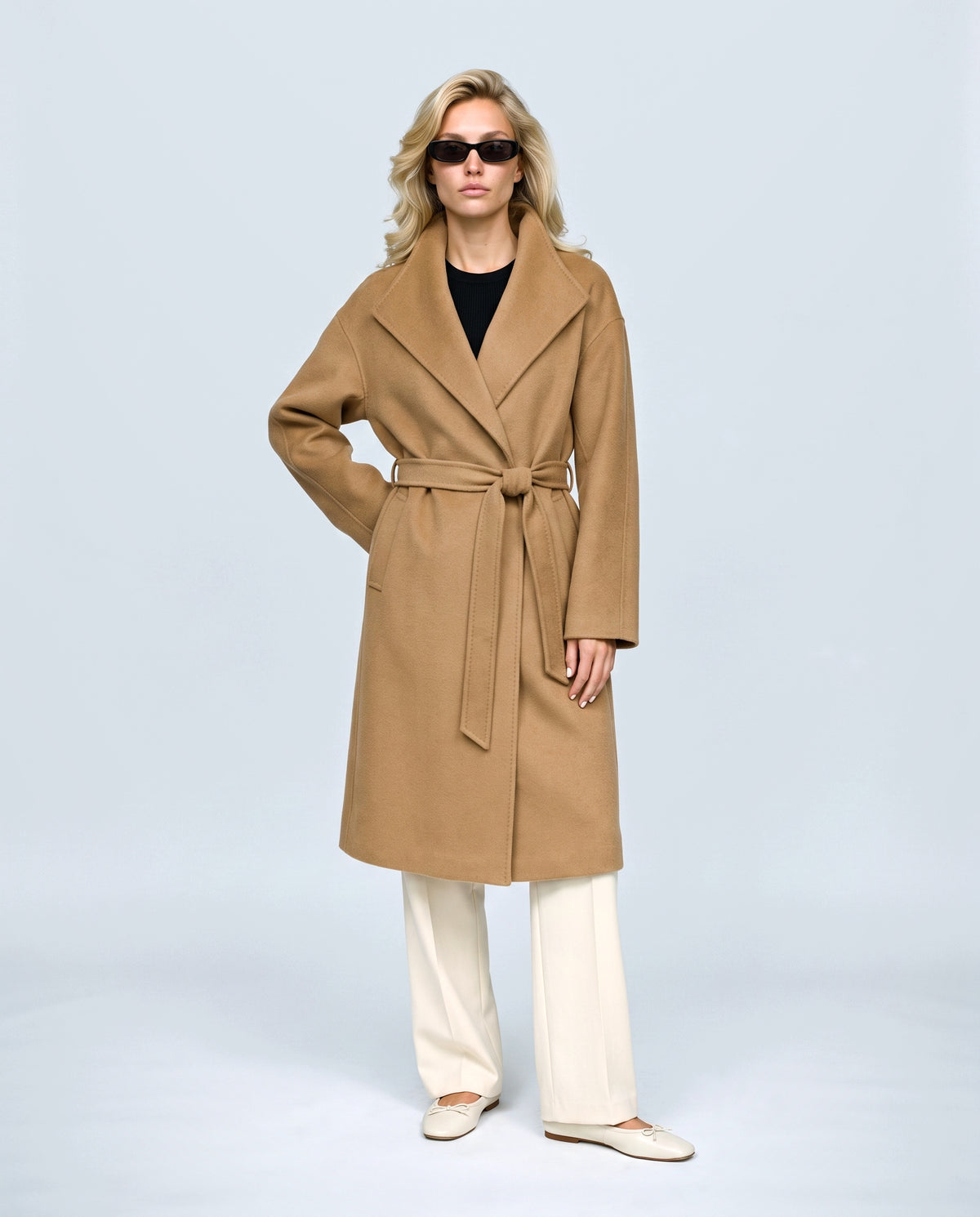The Belted Stand-Collar Coat in Camel, front view on a non-pregnant model