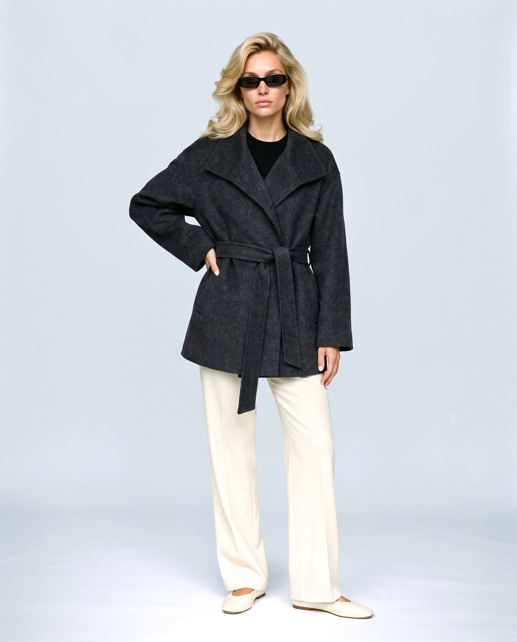 The Belted Stand-Collar Coat in Charcoal, front view on a non-pregnant model