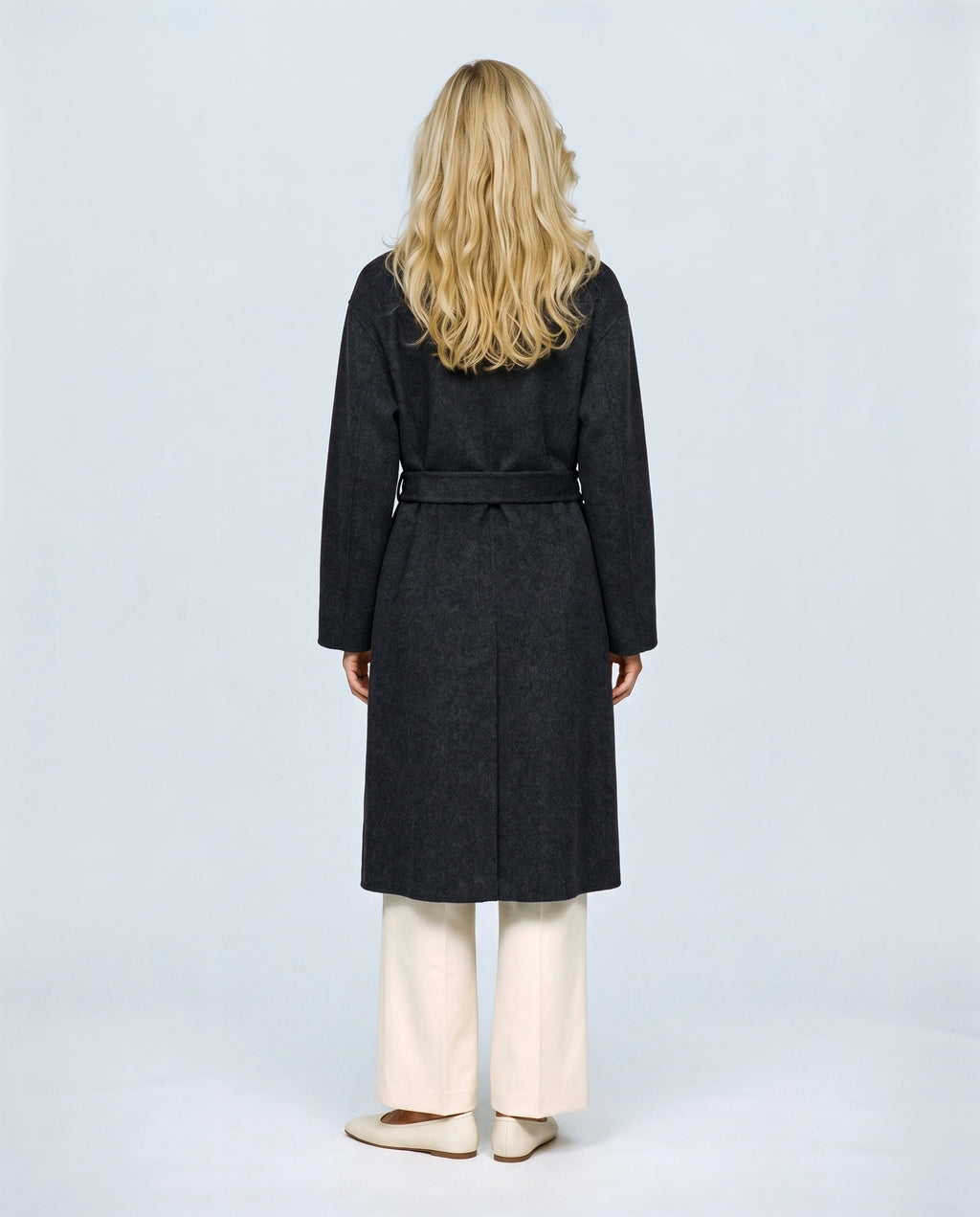 The Belted Stand-Collar Coat in Charcoal, back view on a non-pregnant model
