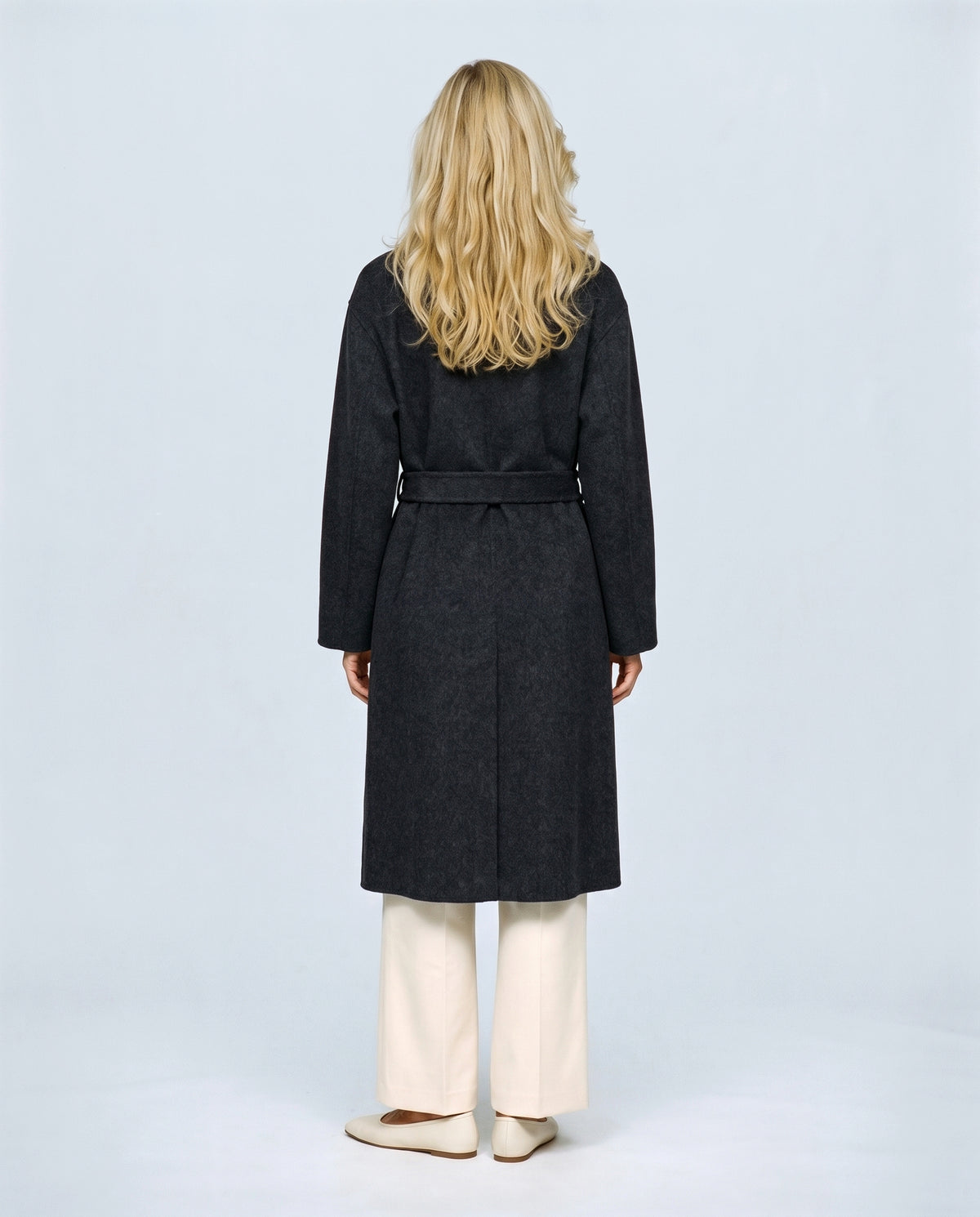The Belted Stand-Collar Coat in Charcoal, back view on a non-pregnant model