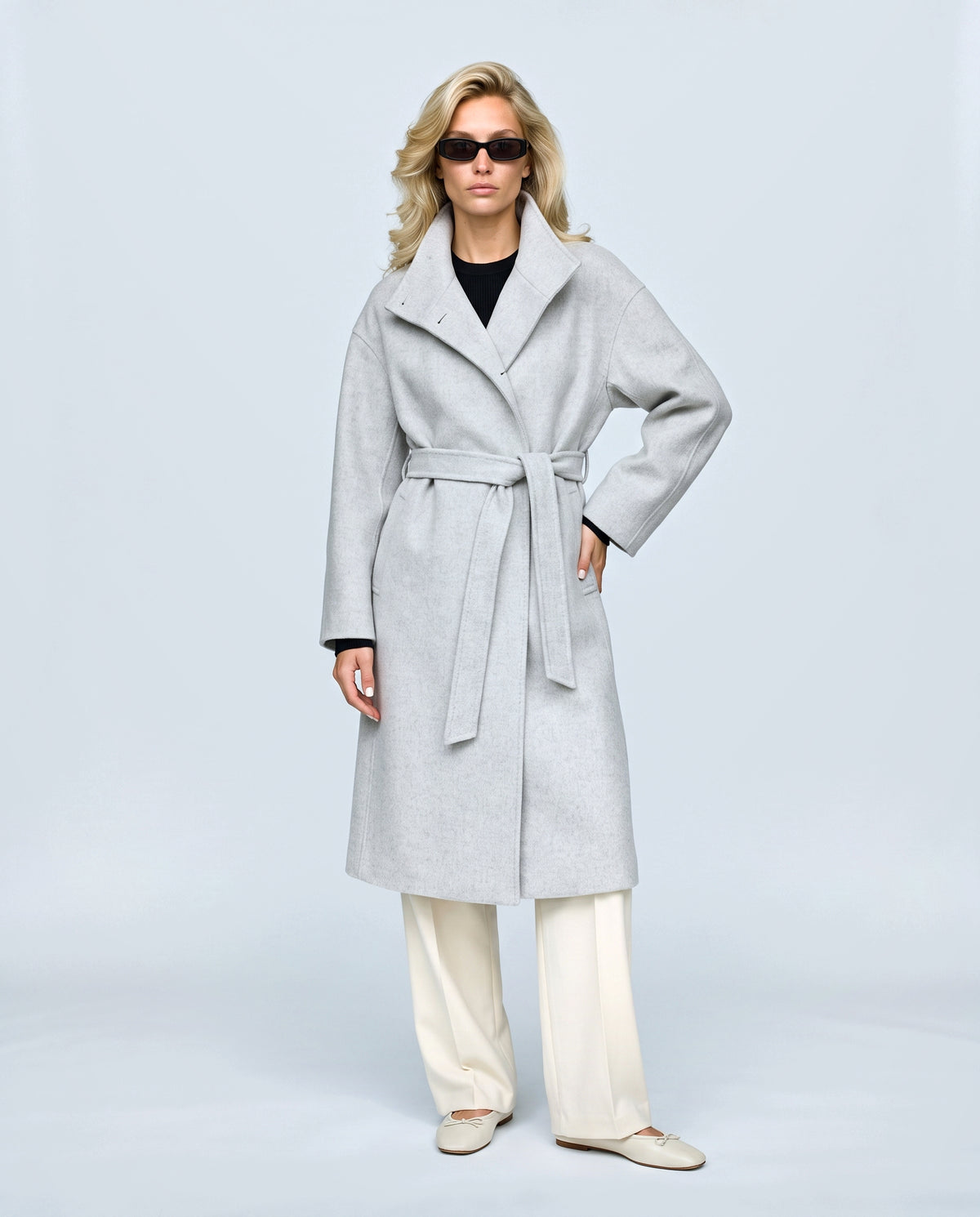 The Belted Stand-Collar Coat in Pale grey, front view on a non-pregnant model