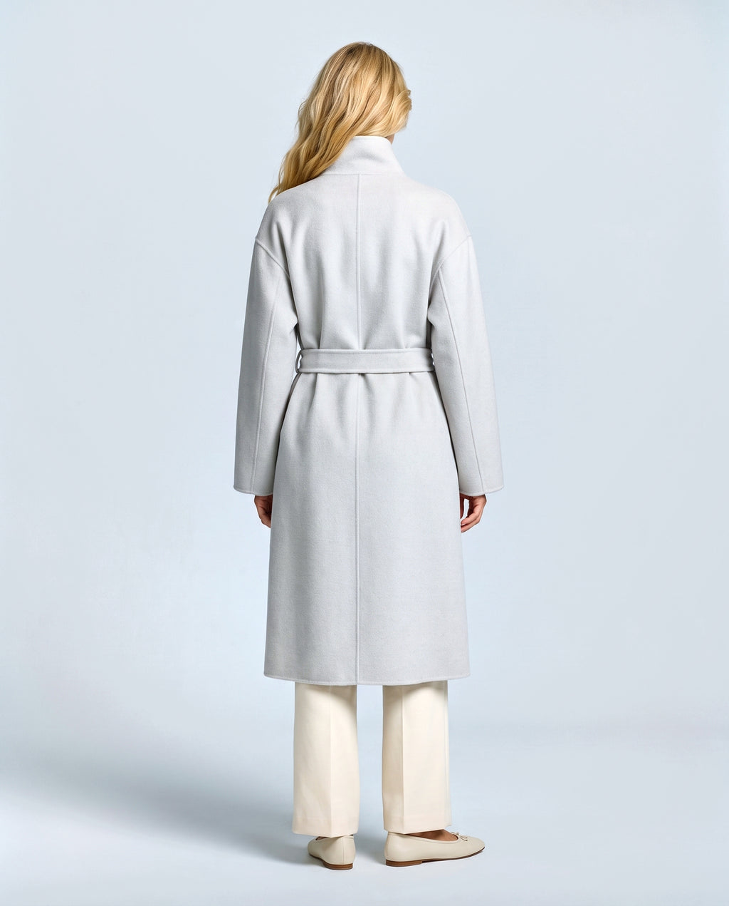 The Belted Stand-Collar Coat in Pale grey, back view on a non-pregnant model
