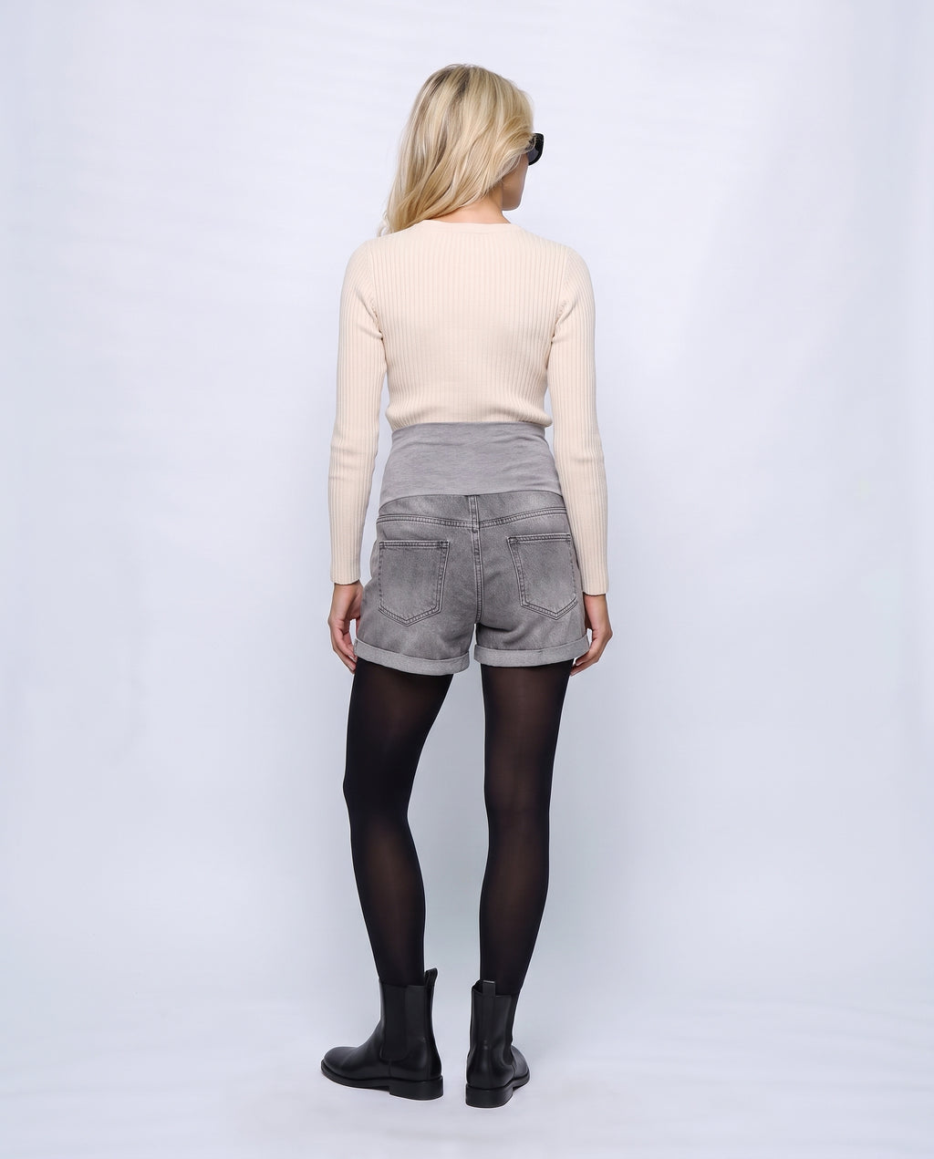The Everyday Maternity Denim Shorts in Grey denim, back view on a non-pregnant model