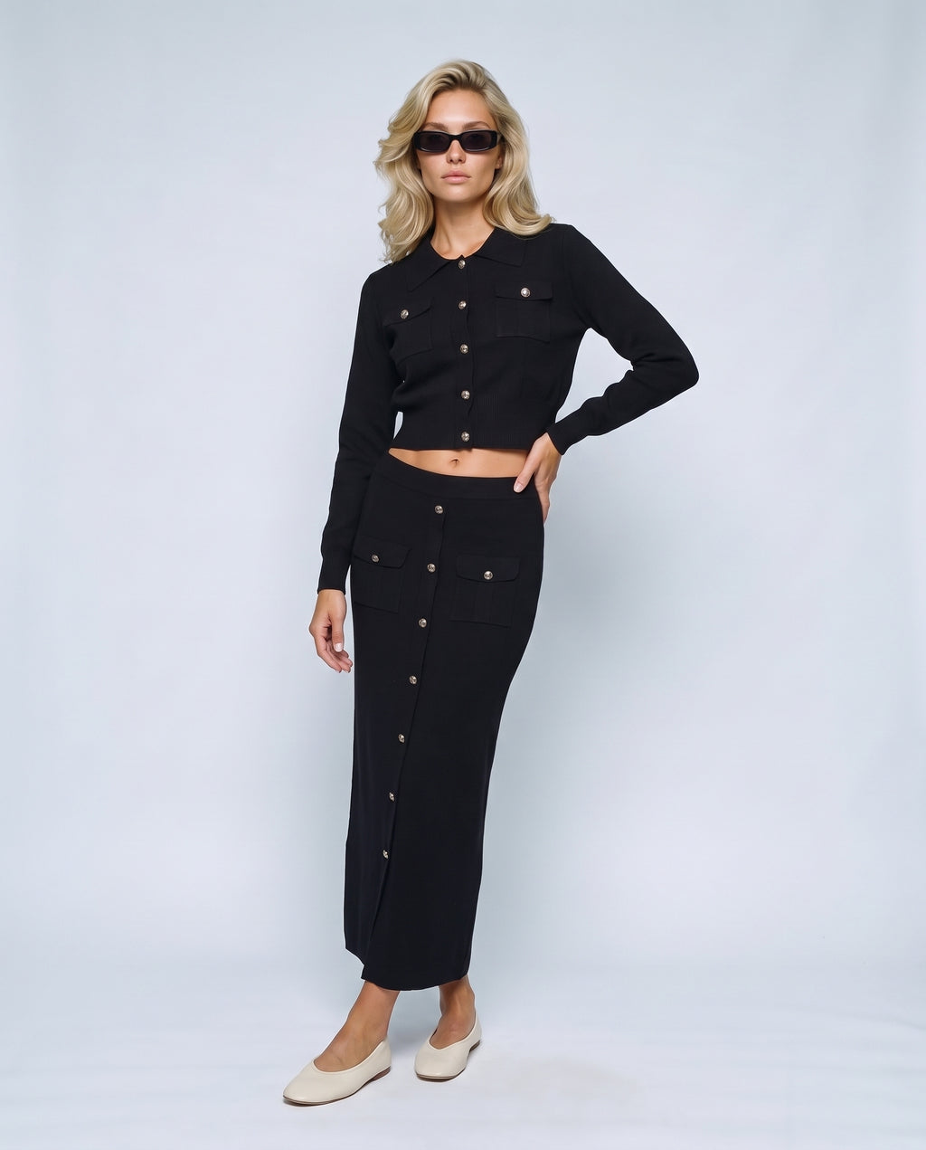 The Knit Blazer & Skirt Set in Black, front view on a non-pregnant model