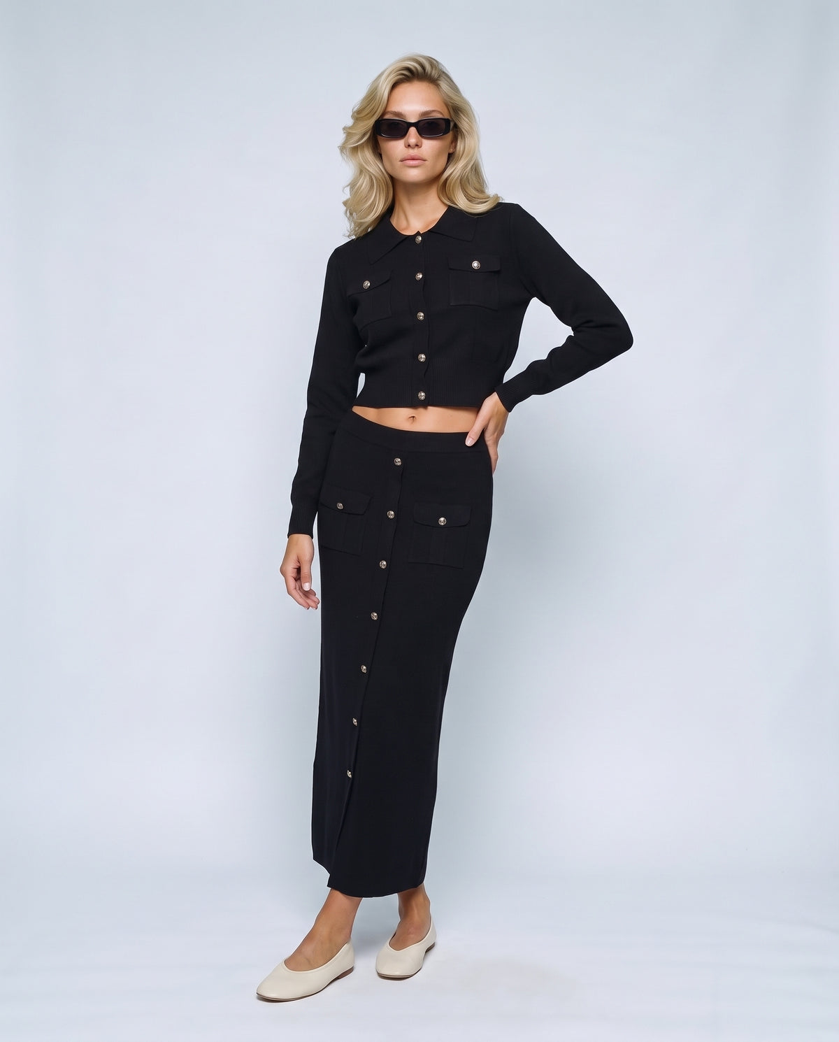 The Knit Blazer & Skirt Set in Black, front view on a non-pregnant model