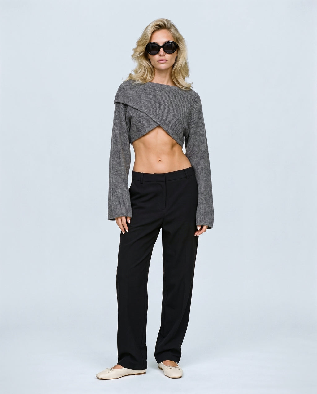 The Crossover Cropped Knit in Grey, front view on a non-pregnant model