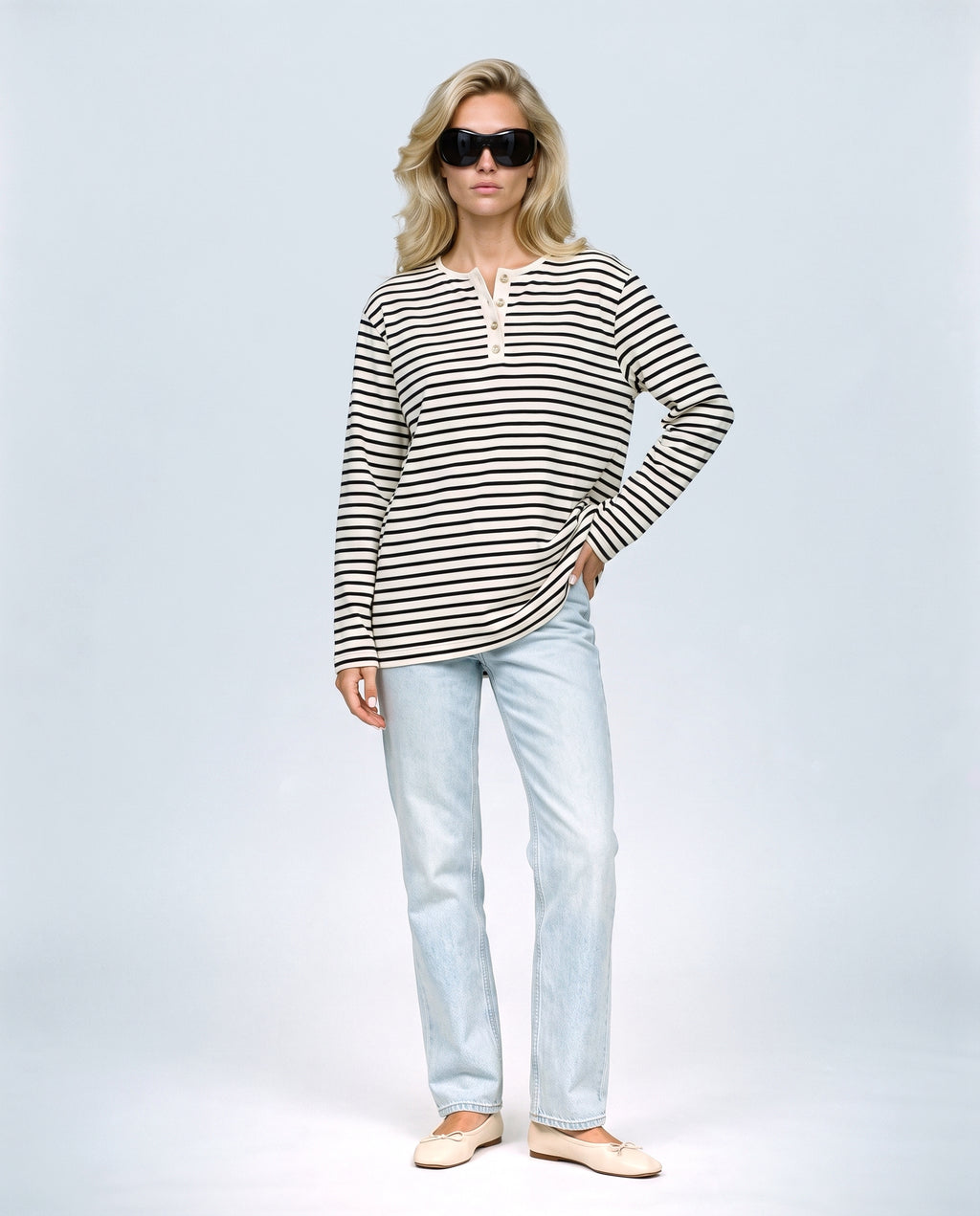 The Relaxed Maternity Stripe Top in Black stripe, front view on a non-pregnant model