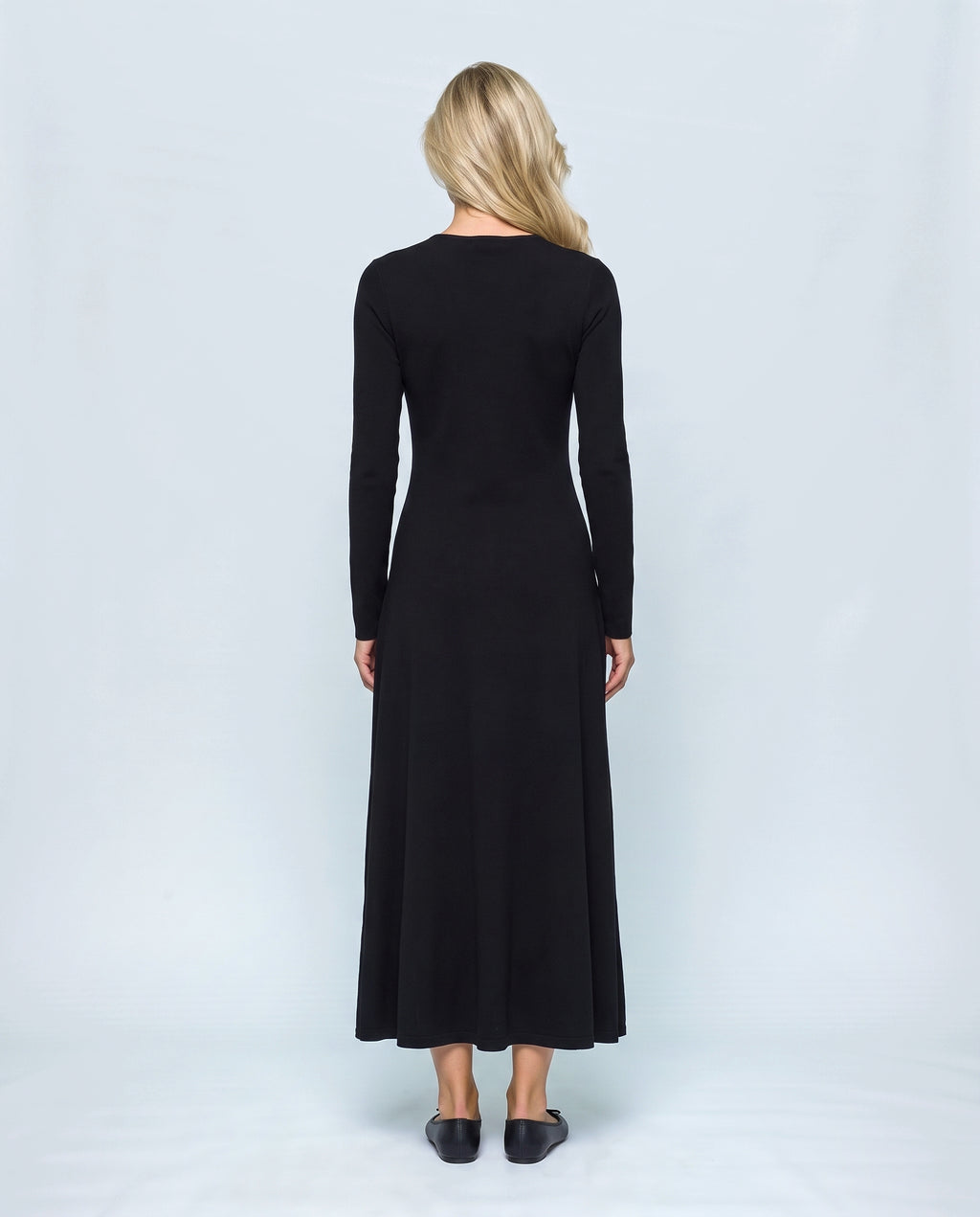 Sylvie V-Neck Knit Maxi Dress in Black, back view on a non-pregnant model