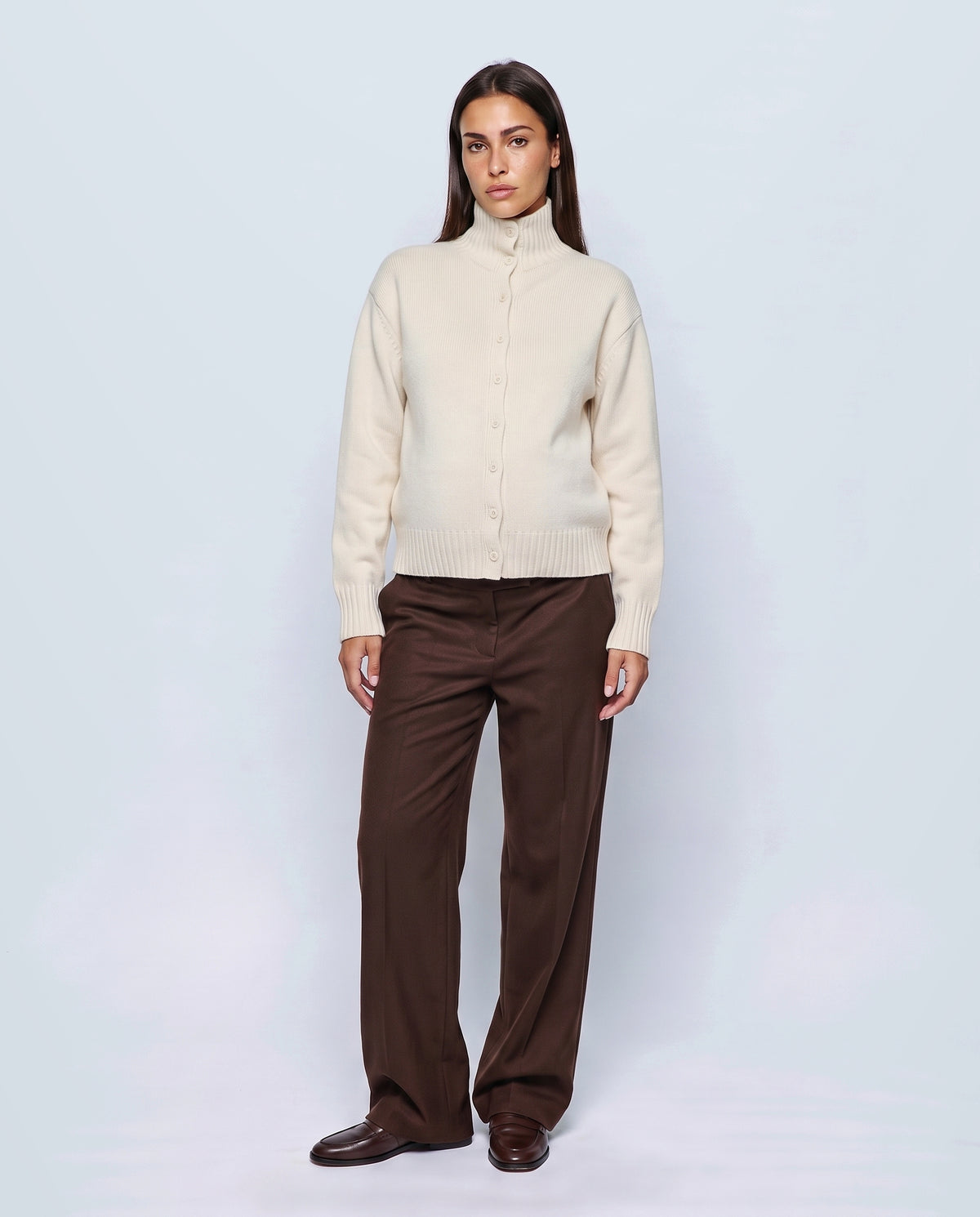 The Heritage Button Cardigan in Milk cream, closed over the bump