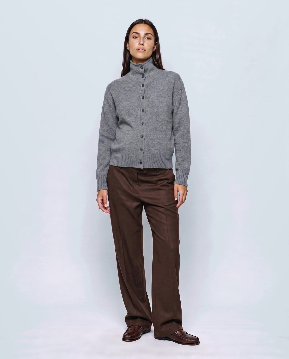 The Heritage Button Cardigan in Paris grey, closed over the bump