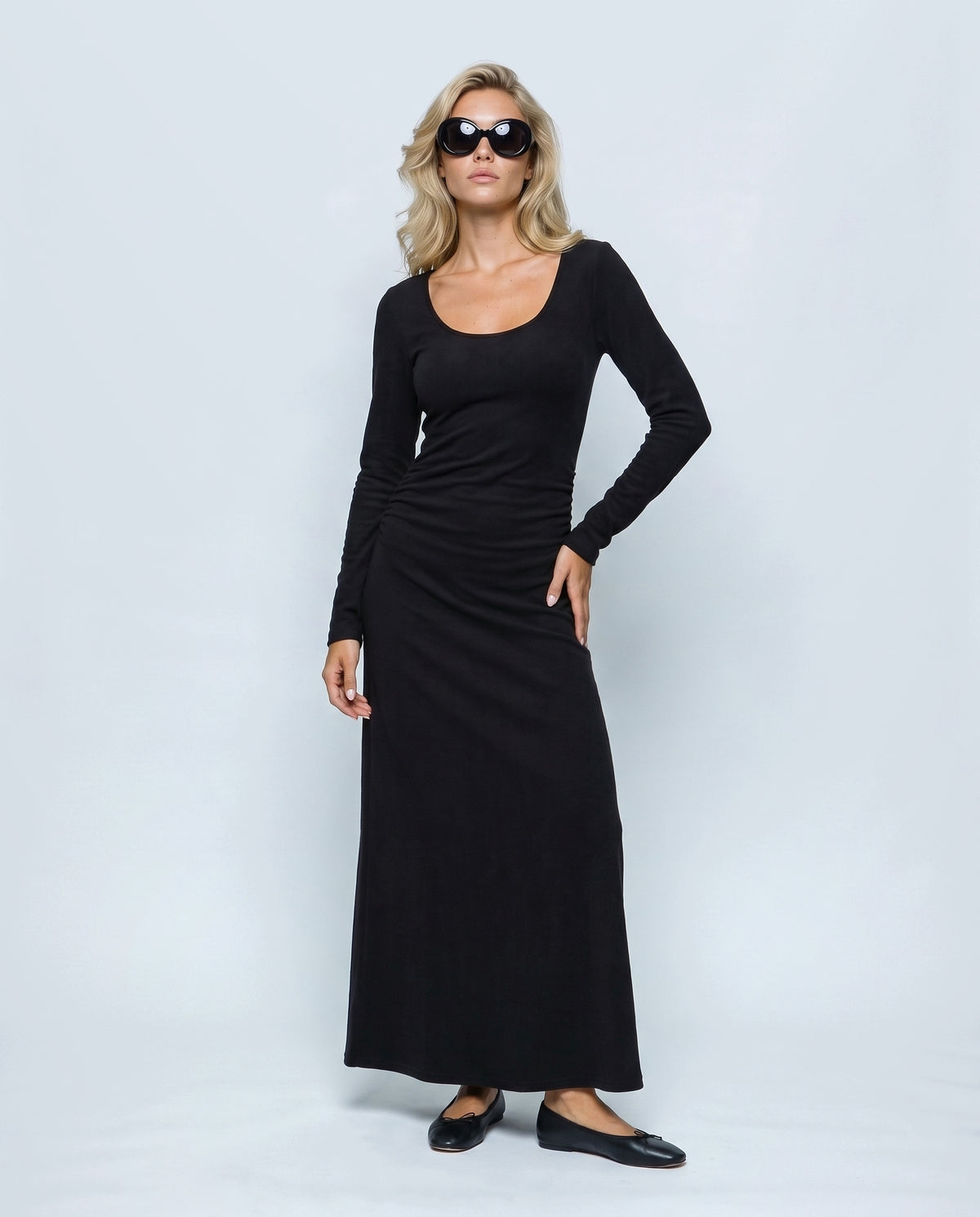 The Funnel-Neck Maxi Dress in Black, front view on a non-pregnant model