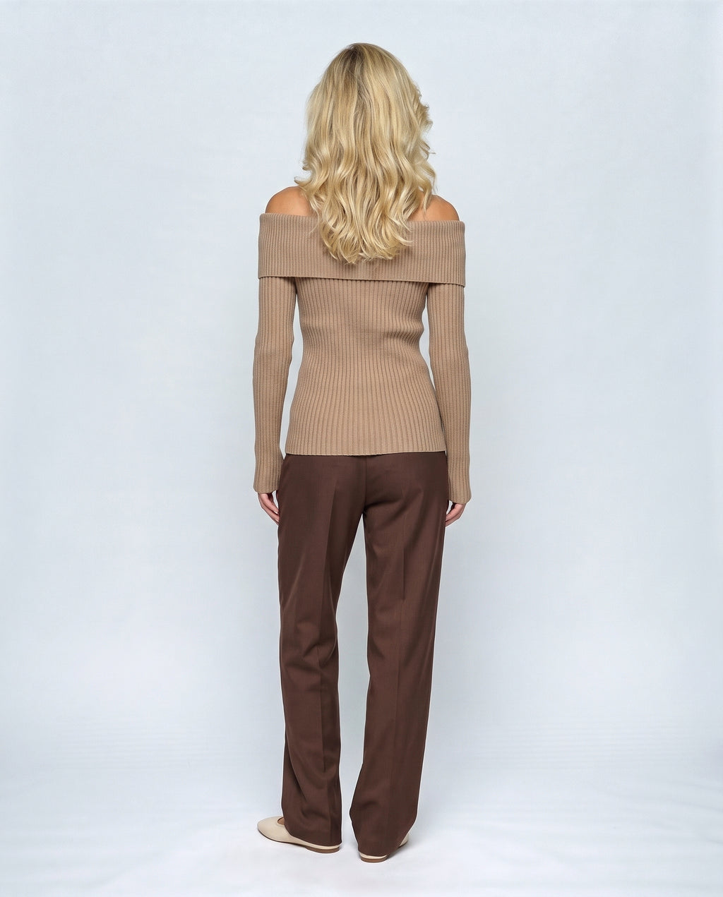The Bardot Ribbed Top in Taupe camel, back view on a non-pregnant model