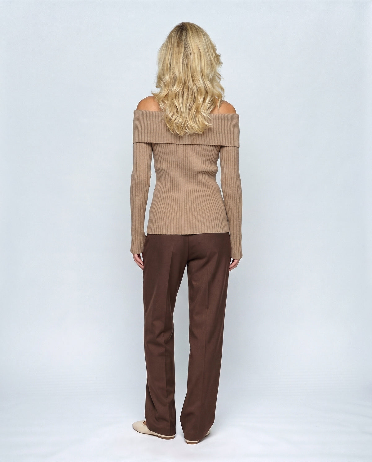 The Bardot Ribbed Top in Taupe camel, back view on a non-pregnant model