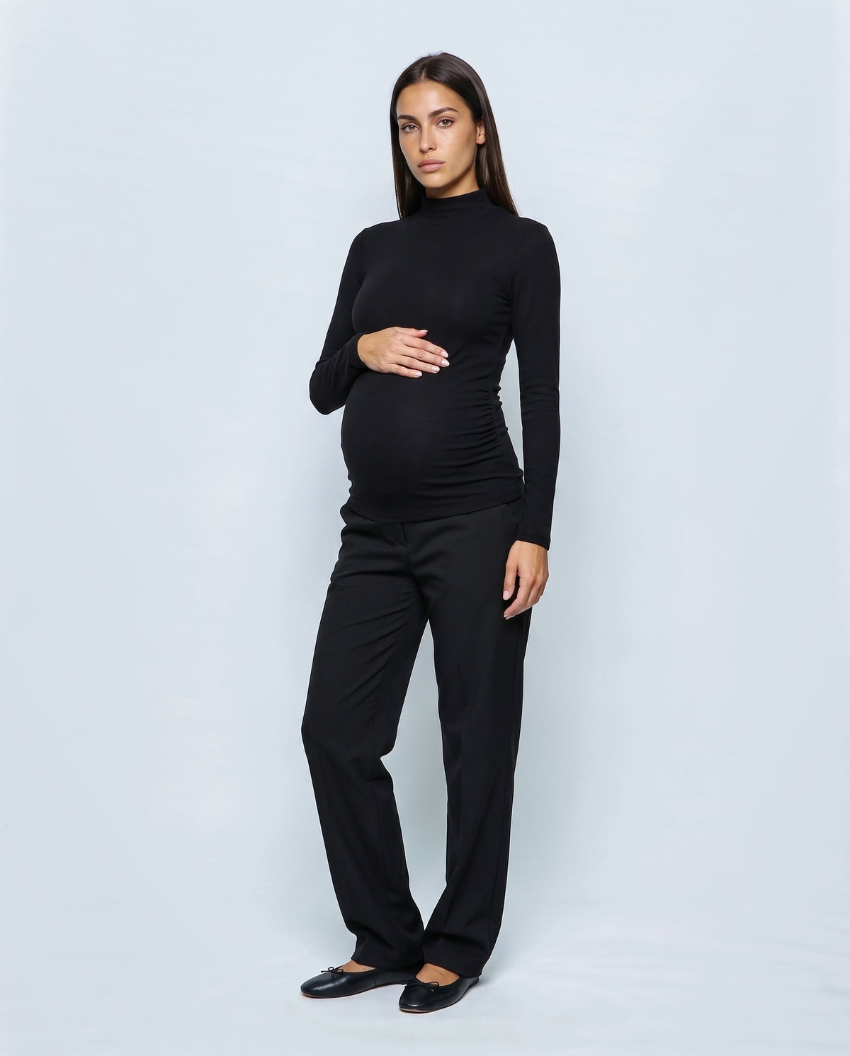 The Maternity Mock-Neck Top in Black, front view