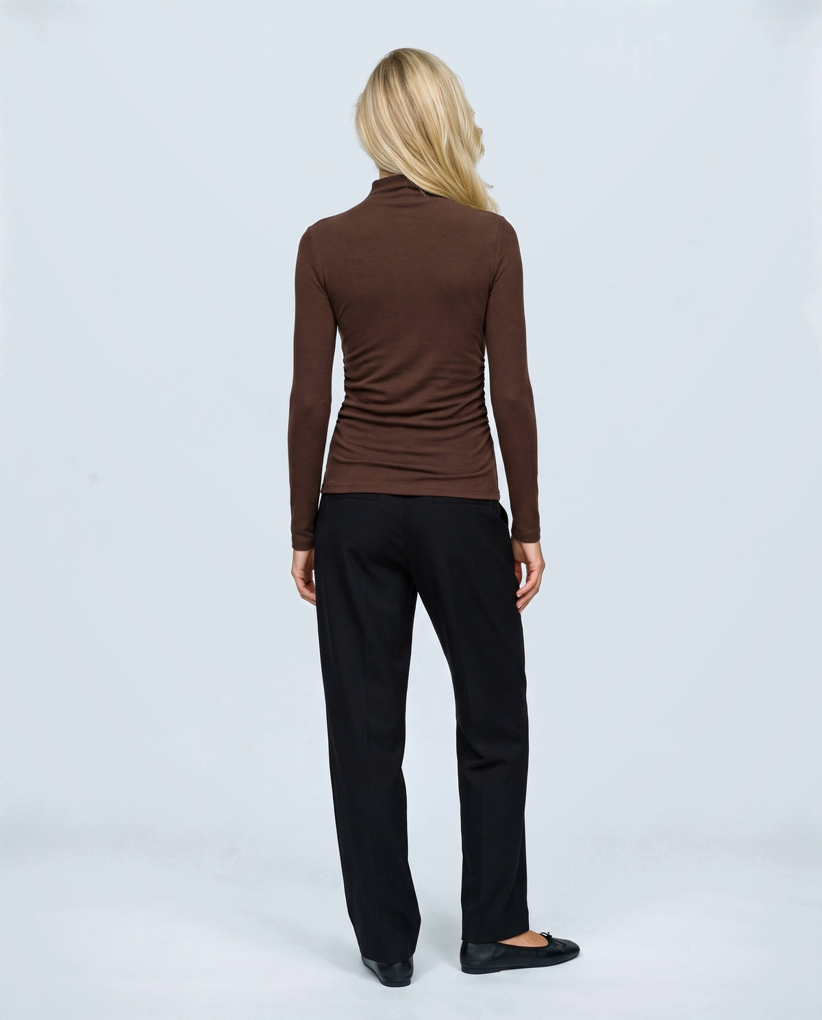 The Maternity Mock-Neck Top in Coffee, back view on a non-pregnant model