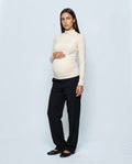 The Maternity Mock-Neck Top in Cream, front view