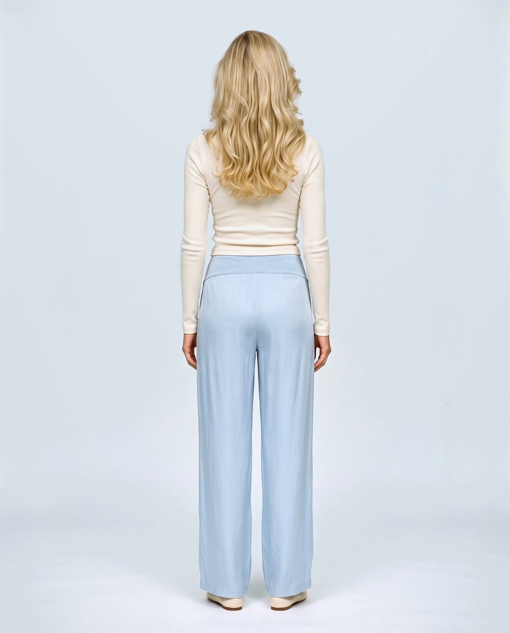 The Fluid Maternity Wide-Leg Trousers in Powder blue, back view on a non-pregnant model