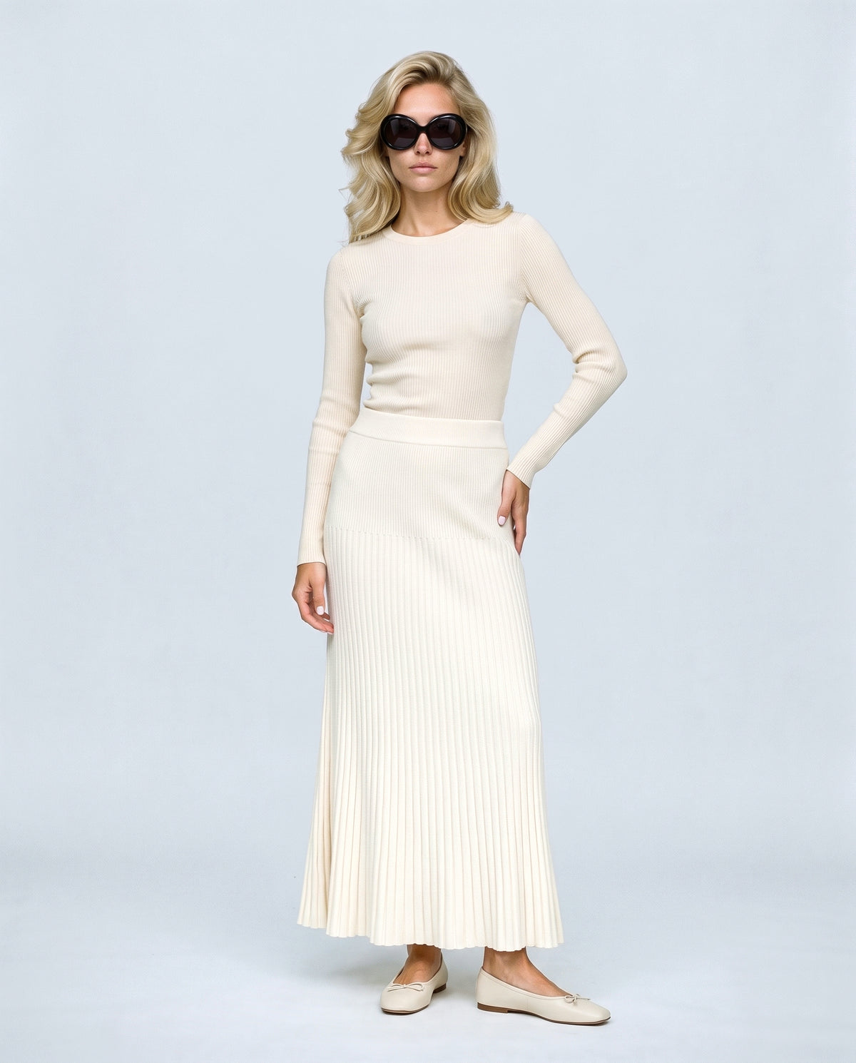 Ines Pleated Maternity Knit Skirt in Off-white, front view on a non-pregnant model