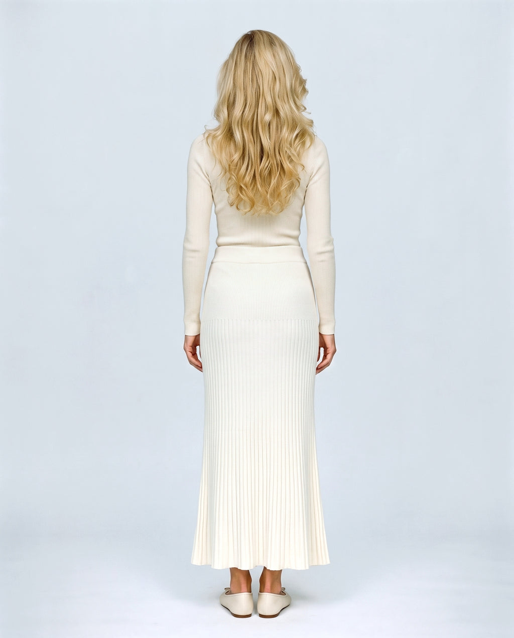 Ines Pleated Maternity Knit Skirt in Off-white, back view on a non-pregnant model