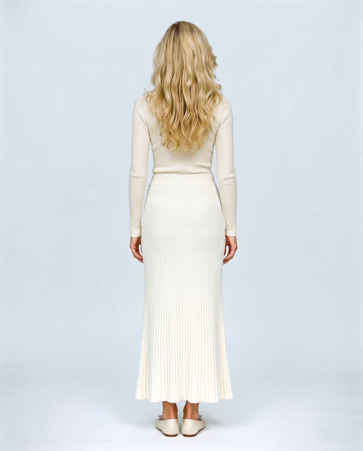 Ines Pleated Maternity Knit Skirt in Off-white, back view on a non-pregnant model